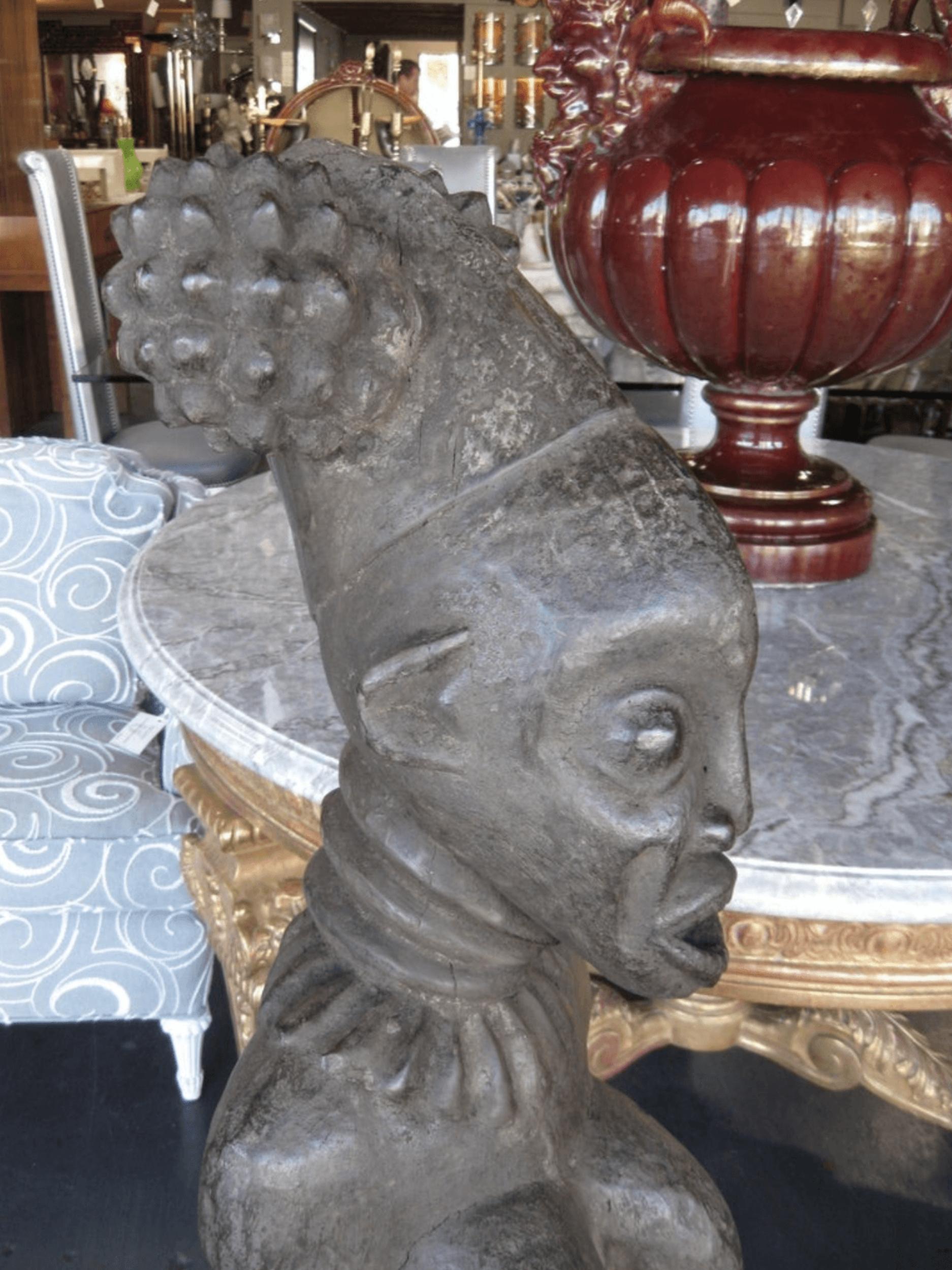 Early 20th Century Hand Carved Male and Female African Statues from Cameroon For Sale