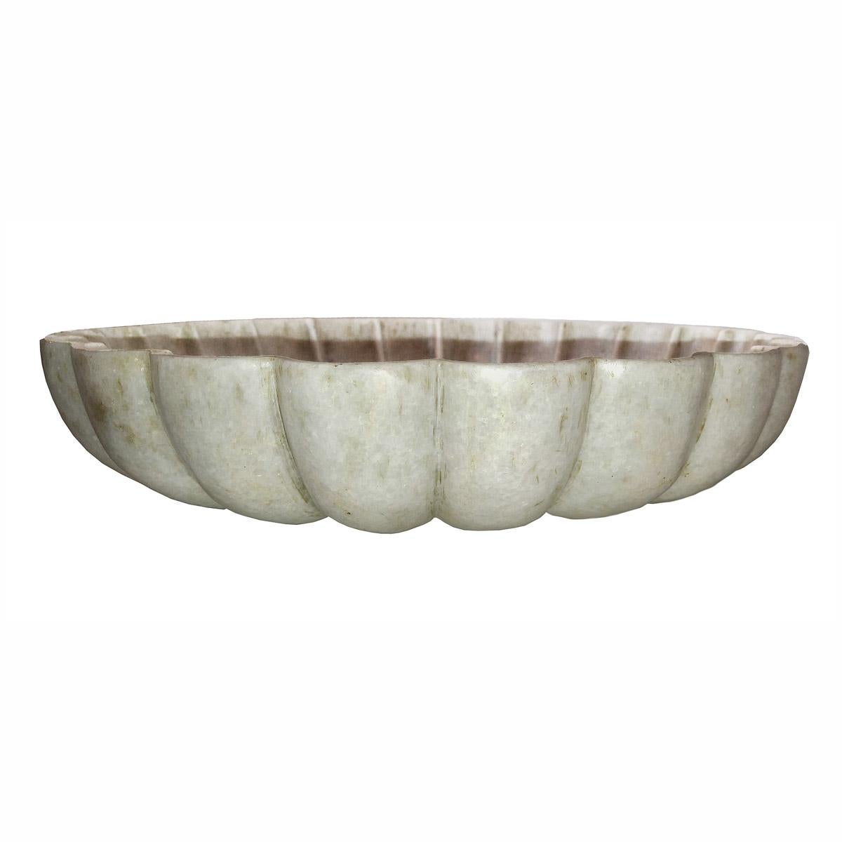 A beautifully carved marble bowl from India, circa 1960. 
18 inches diameter, 3.75 inches high, scalloped pattern. 
An elegant and practical accent for a large table, kitchen counter or outdoor decor.
