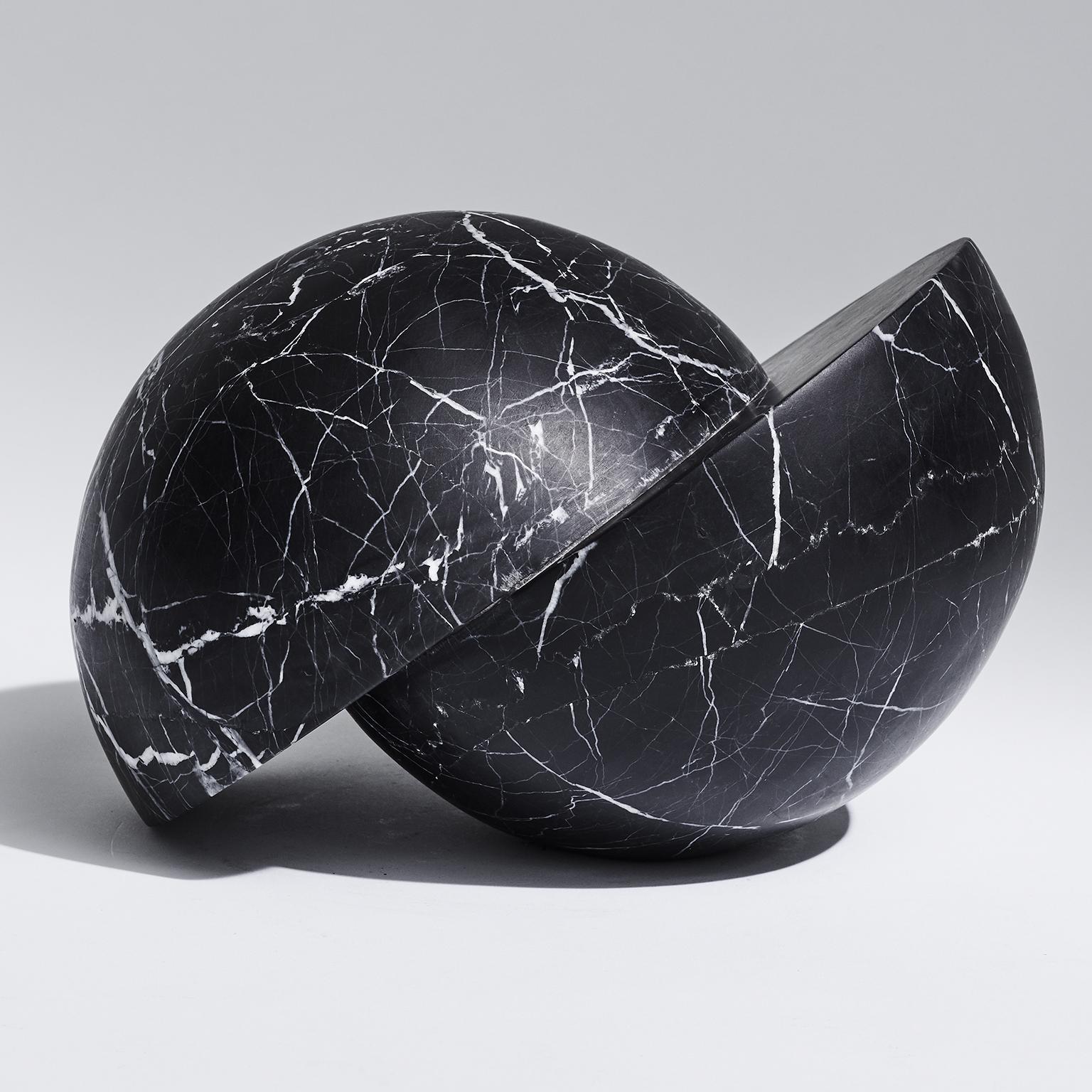 Shifting spheres - Cambio presents a collision of curves through elegant, hand carved Italian marble.

At home as a table centerpiece, sculpture or as shelf decor this is an evocative, versatile art piece.

Dimensions: L235mm/9.3