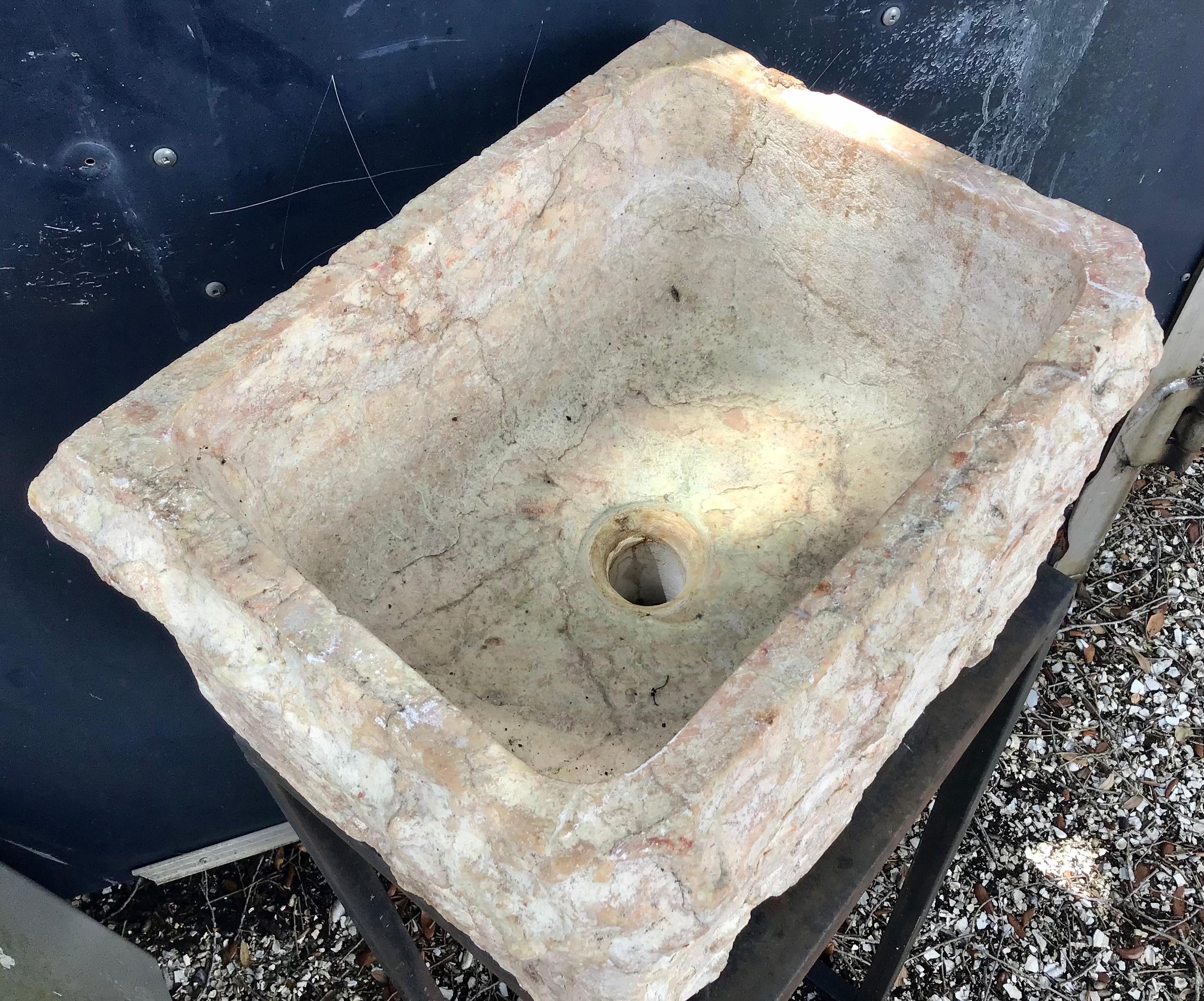 This antique 18th century marble basin is hand carved out one piece of stone. It's ideal for water plants, succulents, orchids or sculptural birdbath. It has been drilled for a drainage hole and can also be used as a unique bathroom sink or water
