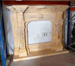 Hand-Carved Marble Fireplace with Classic Ornamentation