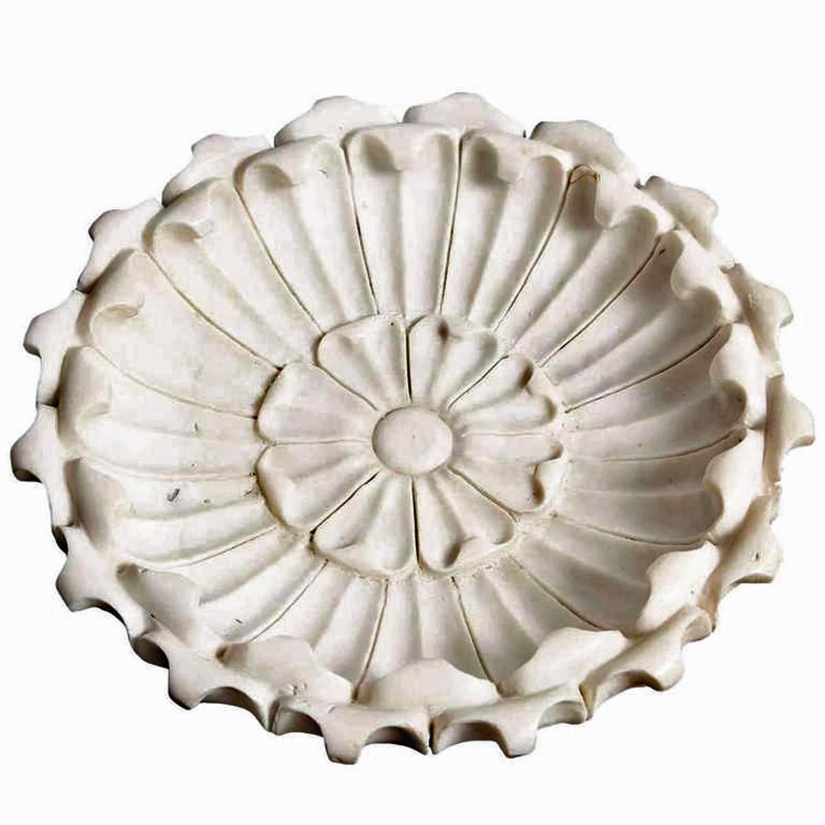 A large, heavy marble bowl, hand-carved with a floral motif. Bone-white colored marble with fine veining. India, circa 1950-1960. A massive slab of fine stone turned by expert artisans into a stunning piece, which can be enjoyed indoors or as an