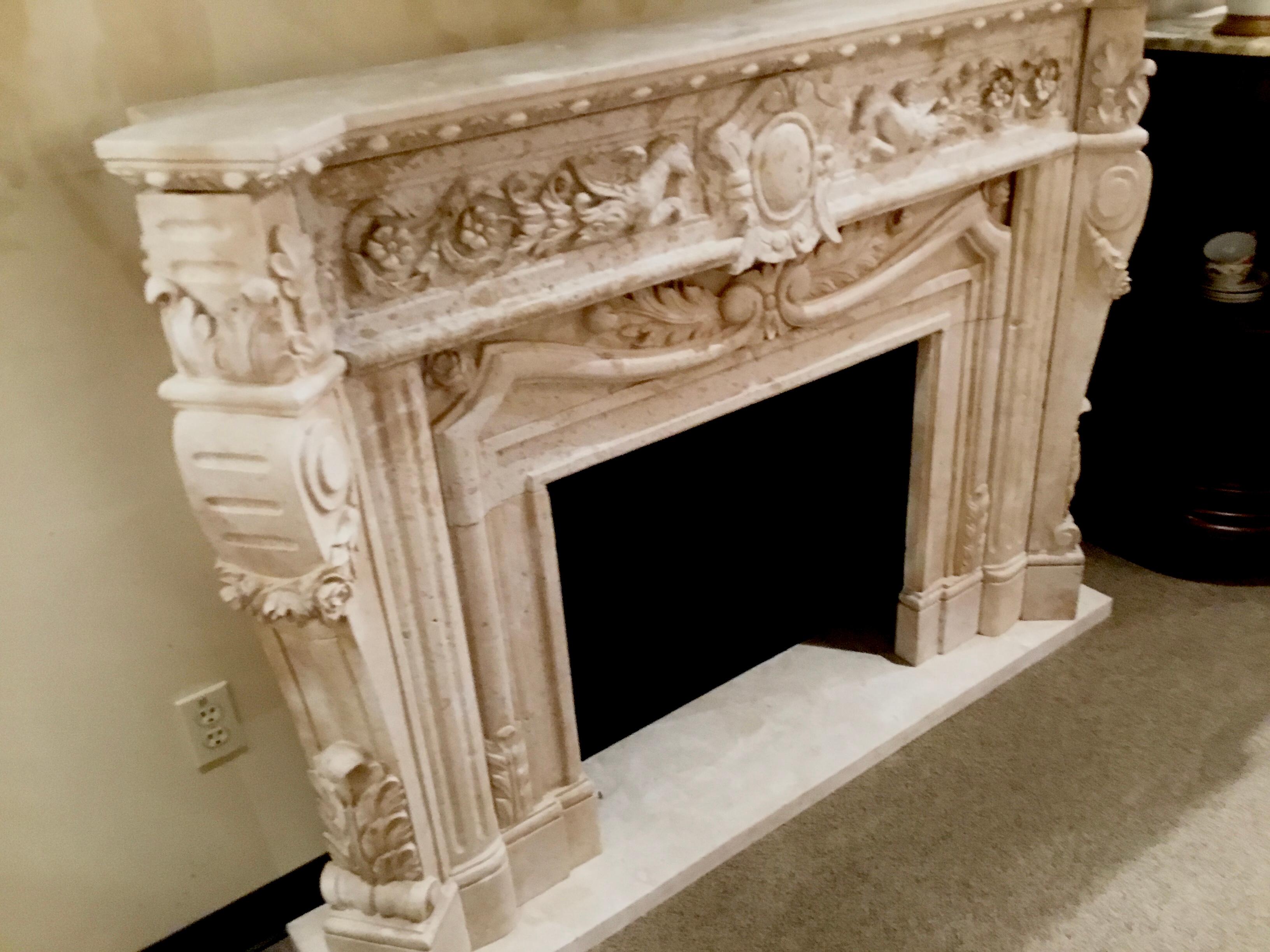 Handsome carved mantle in cream color. Pegasus the flying horse is carved into the
Top horizontal piece. The sides are gracefully curved. The inside dimension is
Measures: 28.5” W by 26” H.