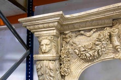 Hand Carved Marble Monumental Fireplace with Classical Motifs and Lion Masks