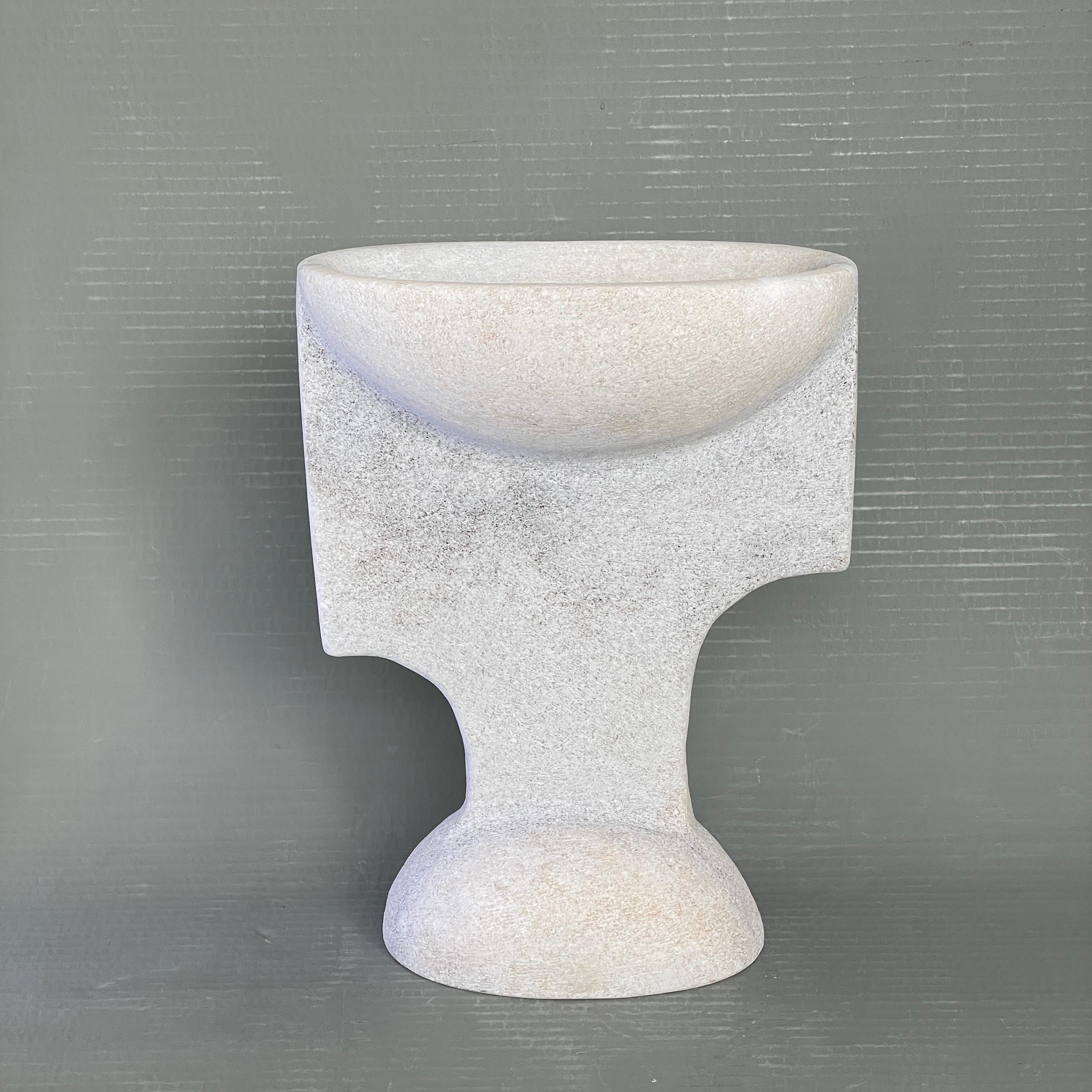 Hand carved marble vessel by Tom Von Kaenel
Materials: Marble
Dimensions: W 11 x D 20 x H 26 cm

Tom von Kaenel, sculptor and painter, was born in Switzerland in 1961. Already in his early
Childhood he was deeply devoted to art. His desire to