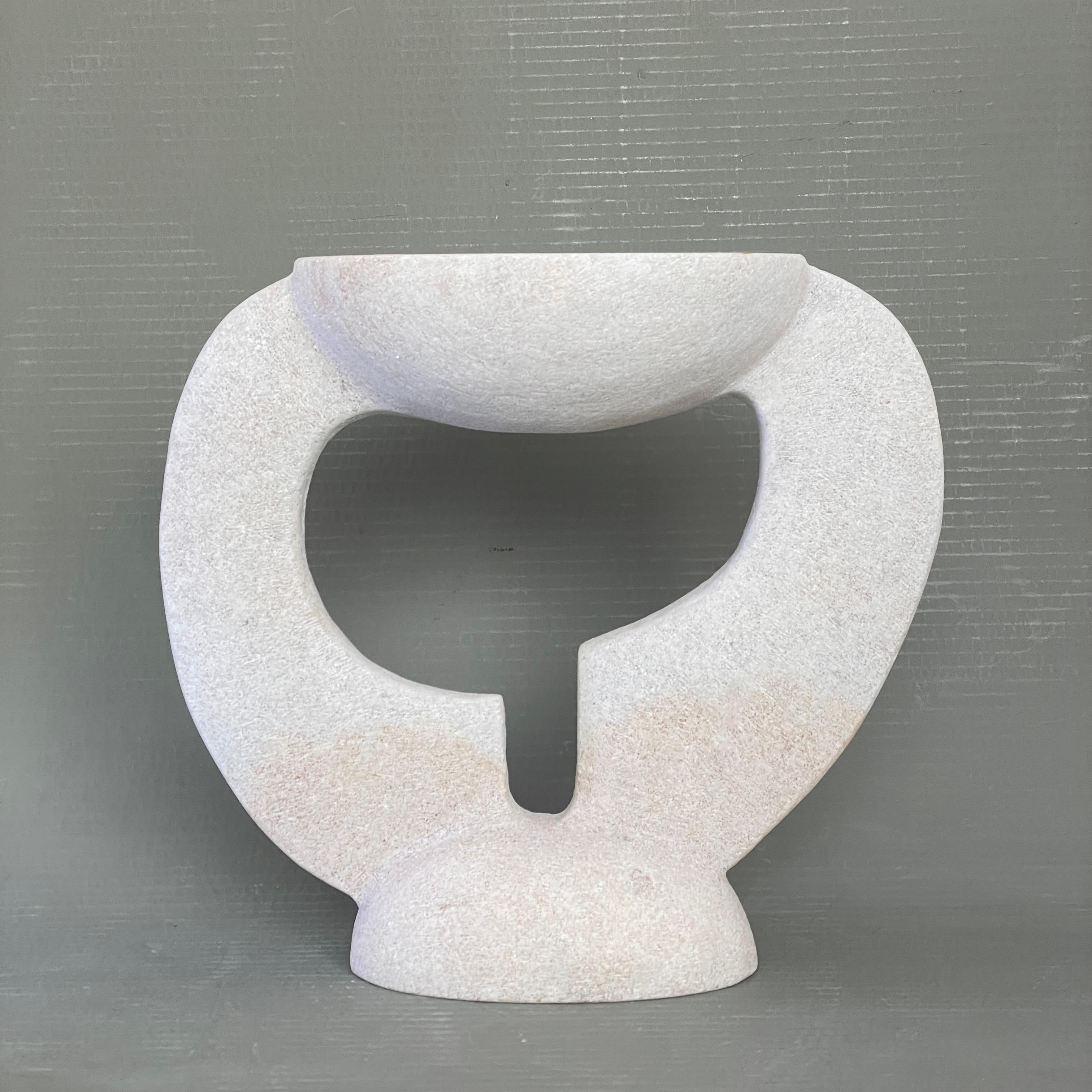 Hand carved marble vessel by Tom Von Kaenel
Materials: Marble
Dimensions: W 12 x D 28 x H 26 cm

Tom von Kaenel, sculptor and painter, was born in Switzerland in 1961. Already in his early
childhood he was deeply devoted to art. His desire to