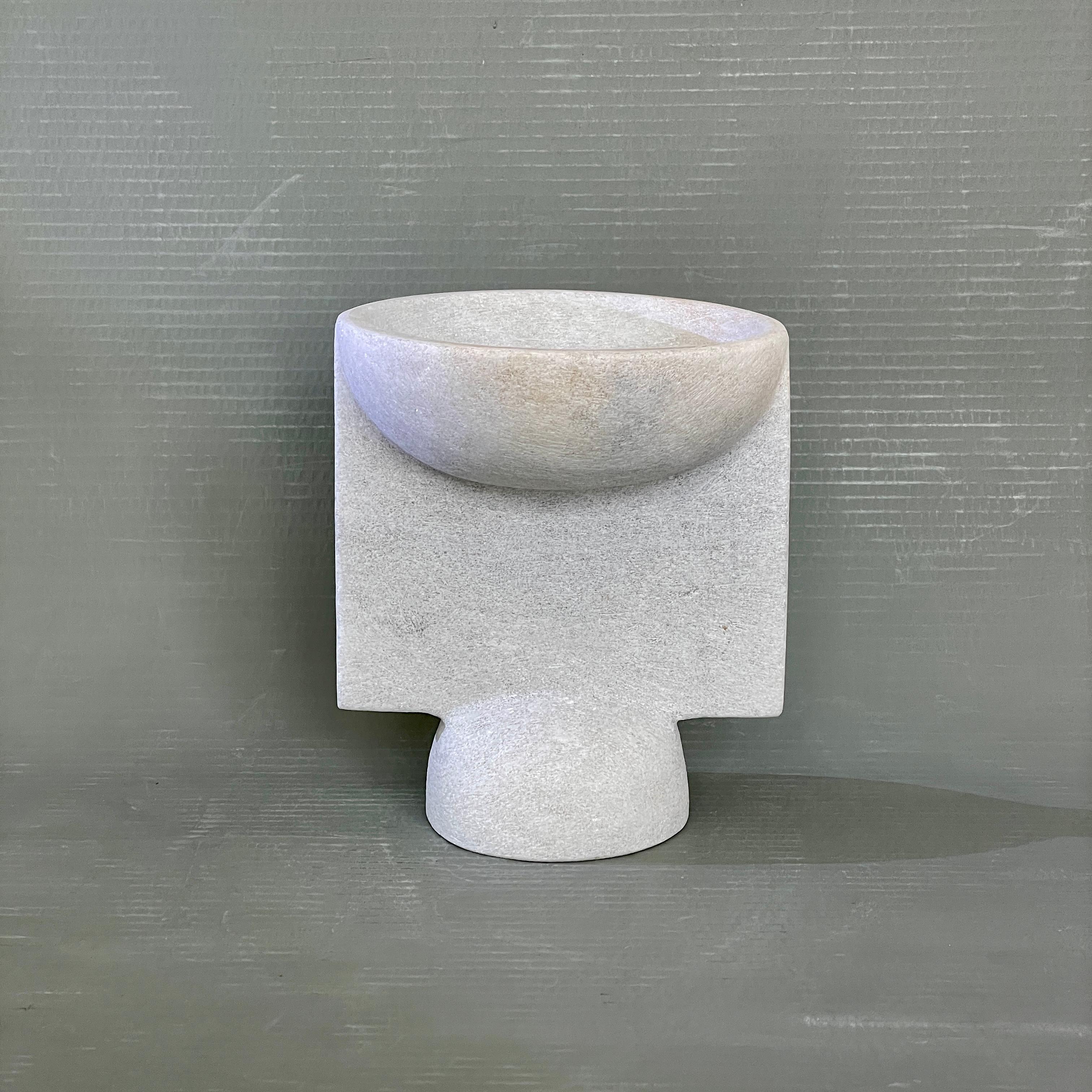 Hand carved marble vessel by Tom Von Kaenel.
Materials: marble.
Dimensions: W 17 x D 17 x H 20 cm.

Tom von Kaenel, sculptor and painter, was born in Switzerland in 1961. Already in his early
childhood he was deeply devoted to art. His desire
