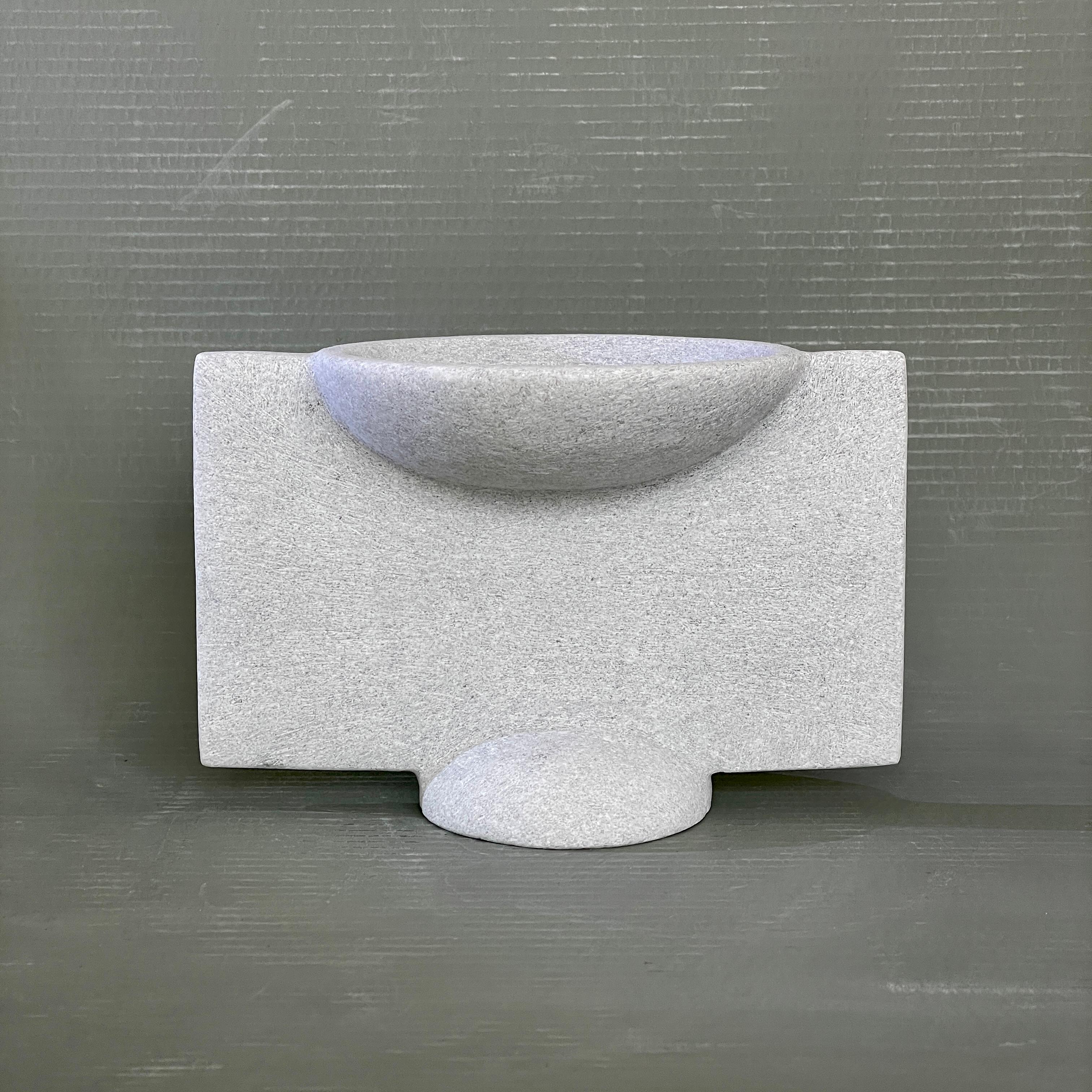 Hand carved marble vessel by Tom Von Kaenel
Materials: marble
Dimensions: W13 x D24 x H18 cm

Tom von Kaenel, sculptor and painter, was born in Switzerland in 1961. Already in his early
childhood he was deeply devoted to art. His desire to