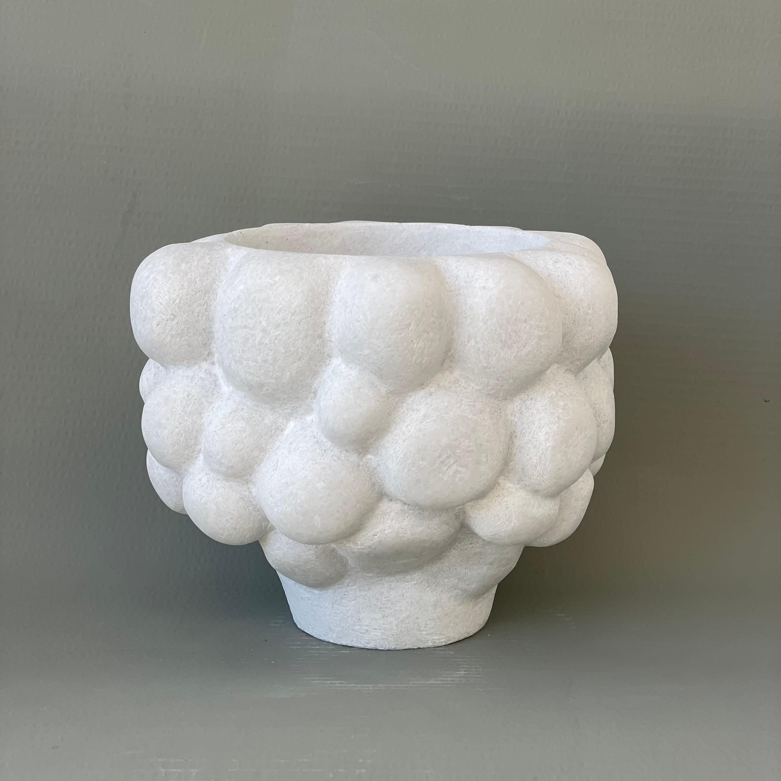 Hand carved marble vessel by Tom Von Kaenel.
Dimensions: D 22 x H 20 cm.
Materials: marble.

Tom von Kaenel, sculptor and painter, was born in Switzerland in 1961. Already in his early childhood he was deeply devoted to art. His desire to bring
