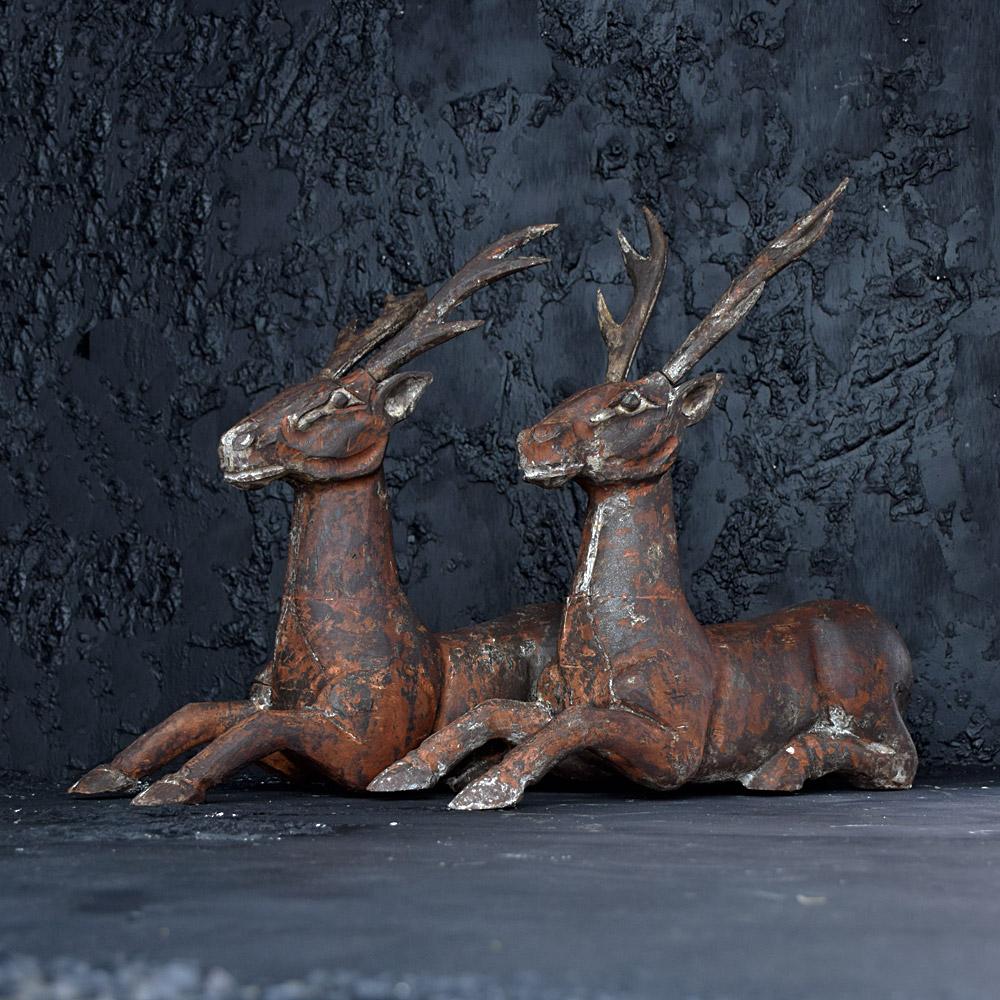 Hand Carved Matched Pair Recumbent Deer Statues In Distressed Condition In London, GB