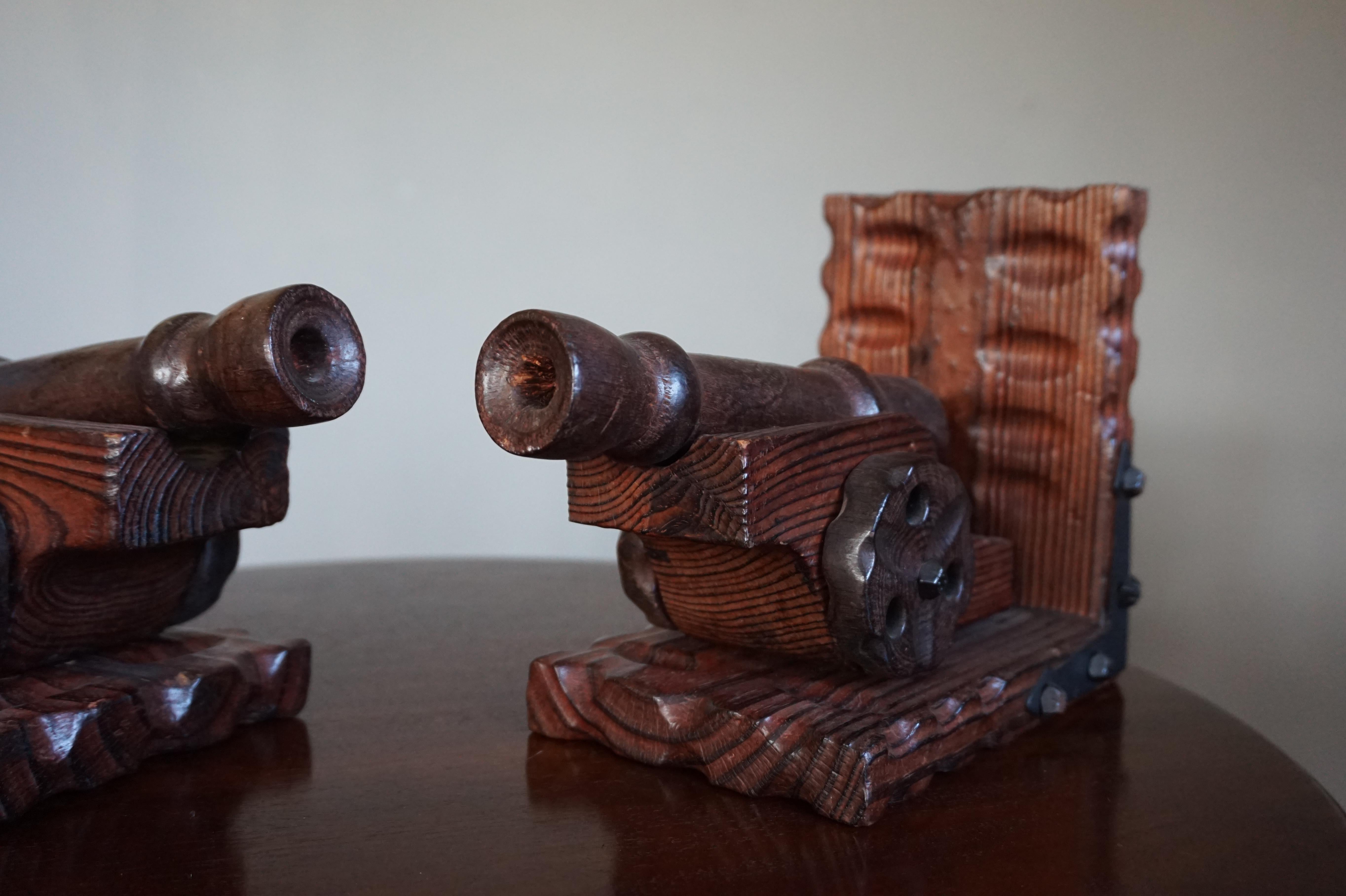 Blackened Hand Carved Medieval Style & Excellent Condition Wooden Canon on Wheels Bookends For Sale