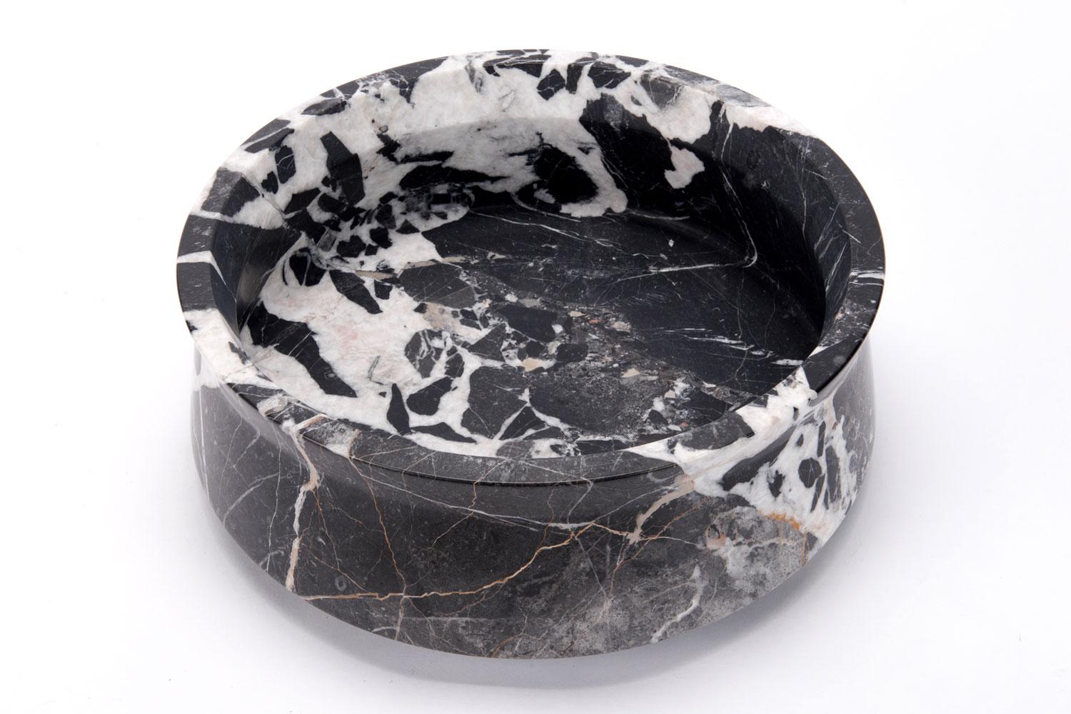 Patterned black and white marble bowl with engraved date and number is hand carved by French artist Gilles Caffier.

Renowned for his unique and limited edition pieces, Gilles Caffier creates topical textures and transforms them into exquisite