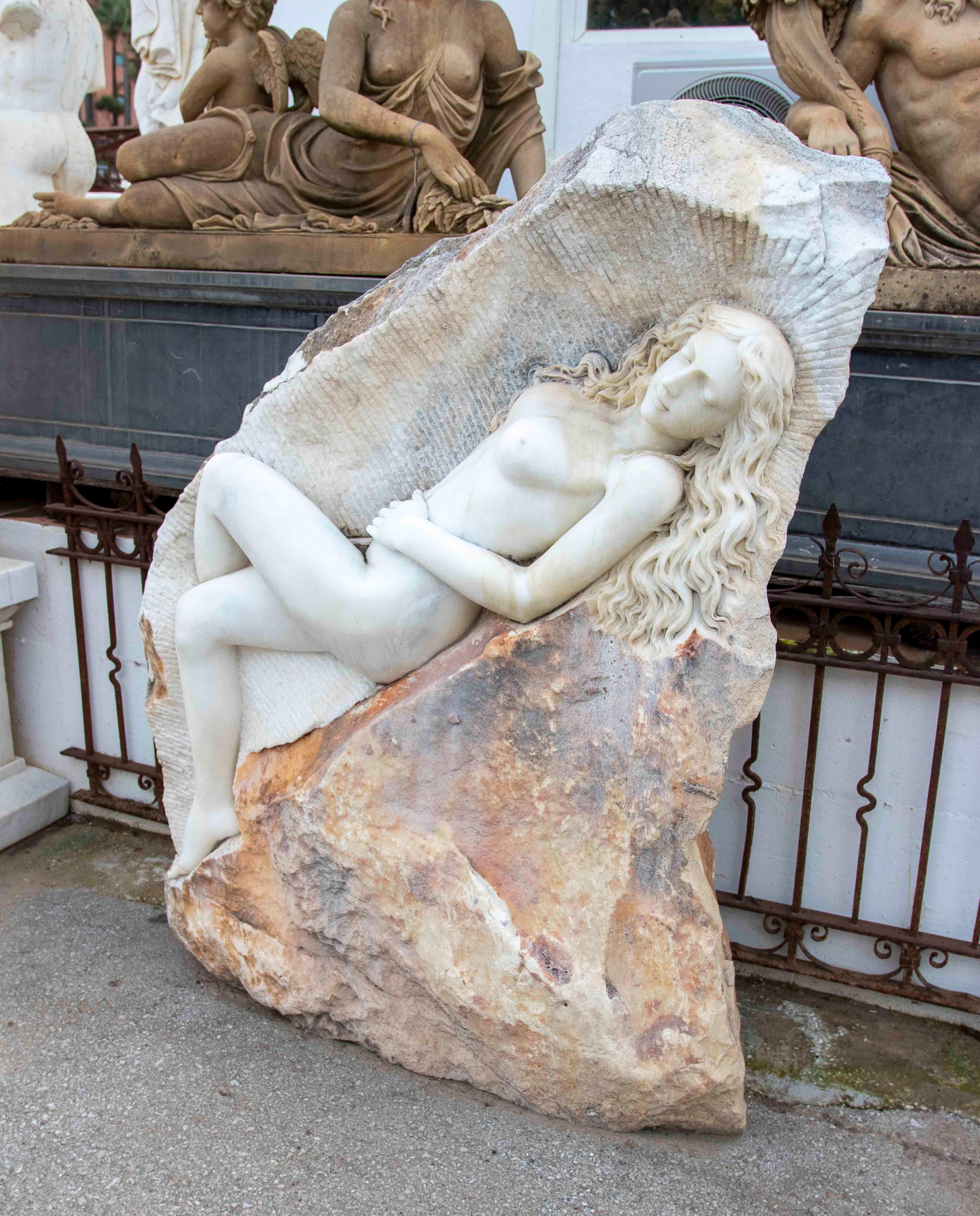 Asian Hand Carved Monumental Sculpture of a Woman on Marble Rock. For Sale