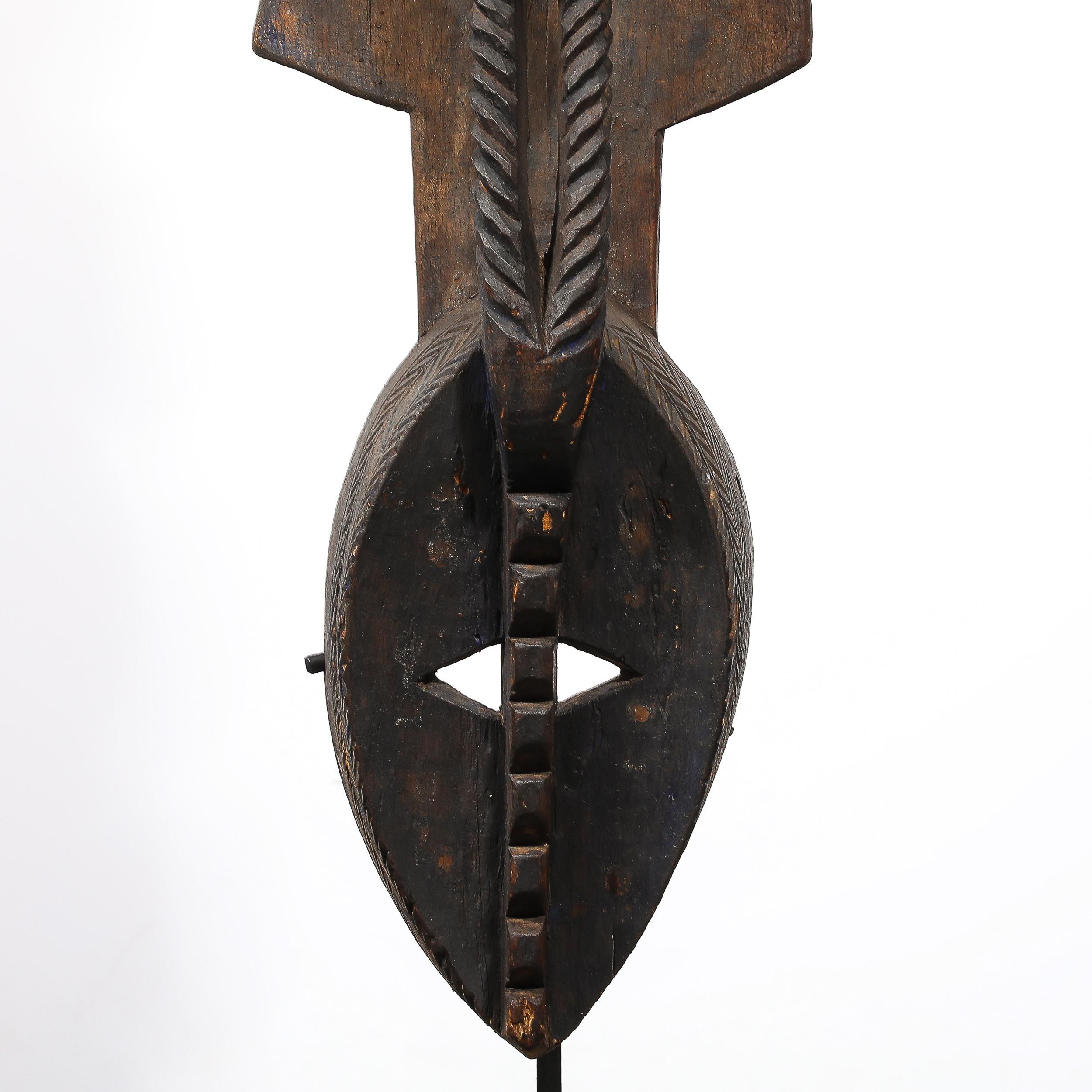 Hand-Carved Mossi Tribe Ceremonial Wood Mask on Elevated Sculptural Base In Excellent Condition For Sale In New York, NY