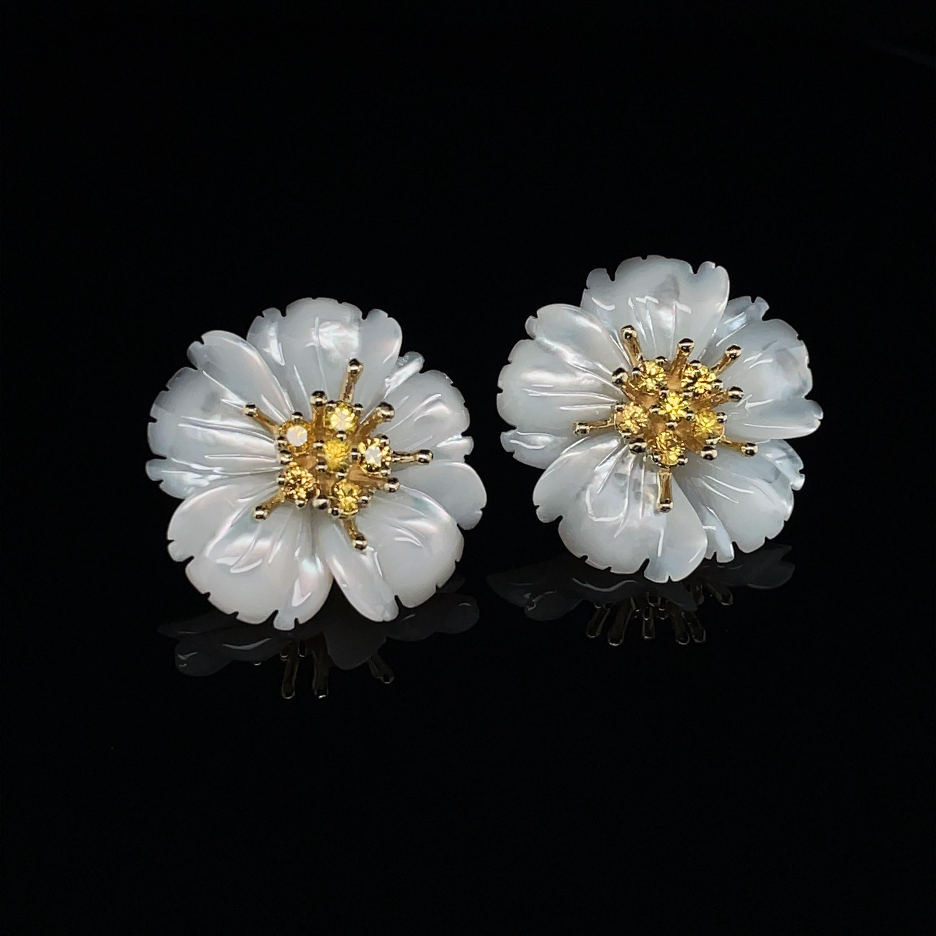These finely hand-carved mother-of-pearl earrings will add eye-catching elegance to your jewelry wardrobe! The 3-dimensional flowers were intricately carved from lustrous, high-quality mother-of-pearl. The gold posts were designed to be the