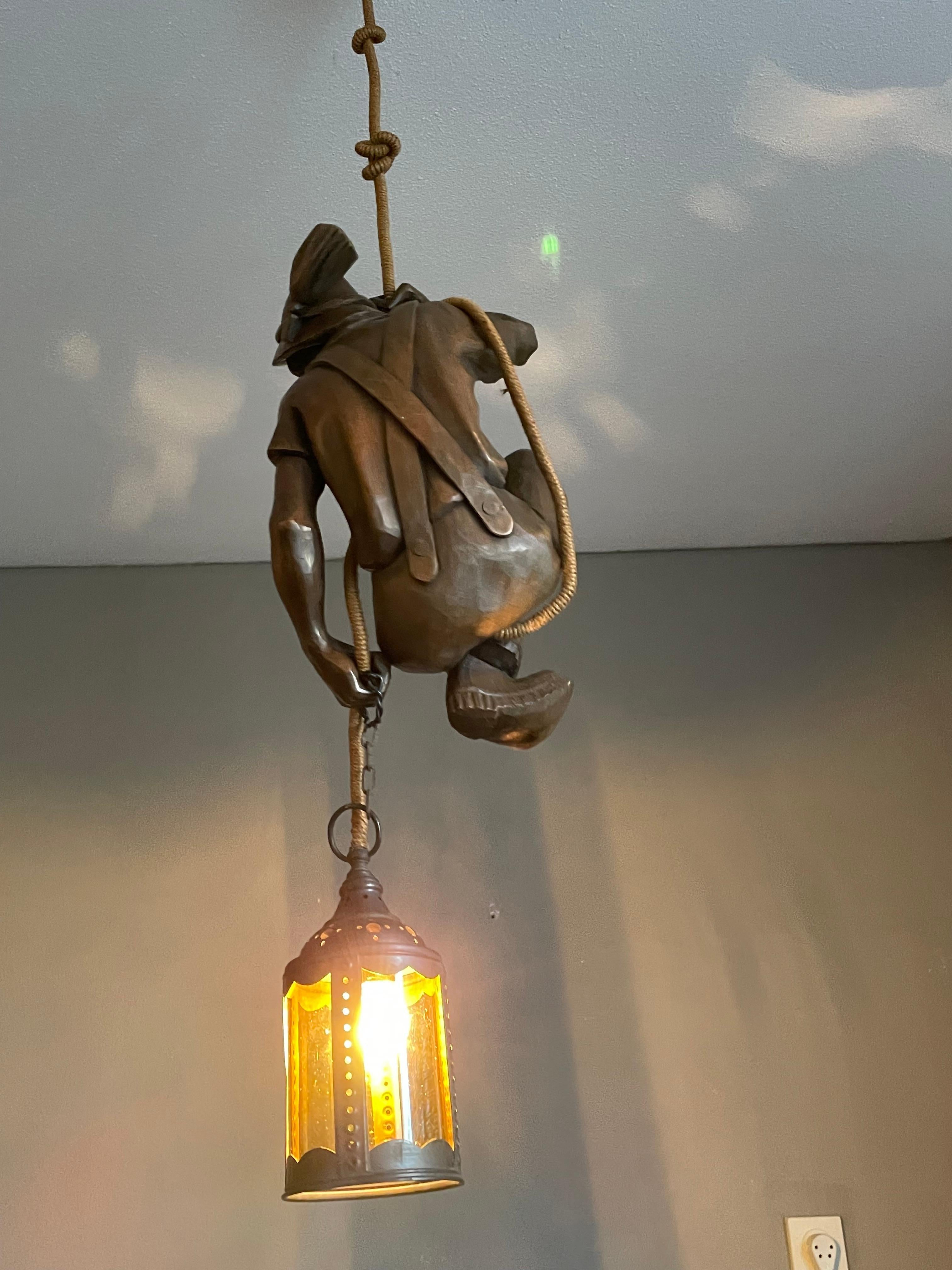 20th Century Hand Carved Mountaineer Sculpture Pendant Light w. Brass Arts & Crafts Lantern For Sale