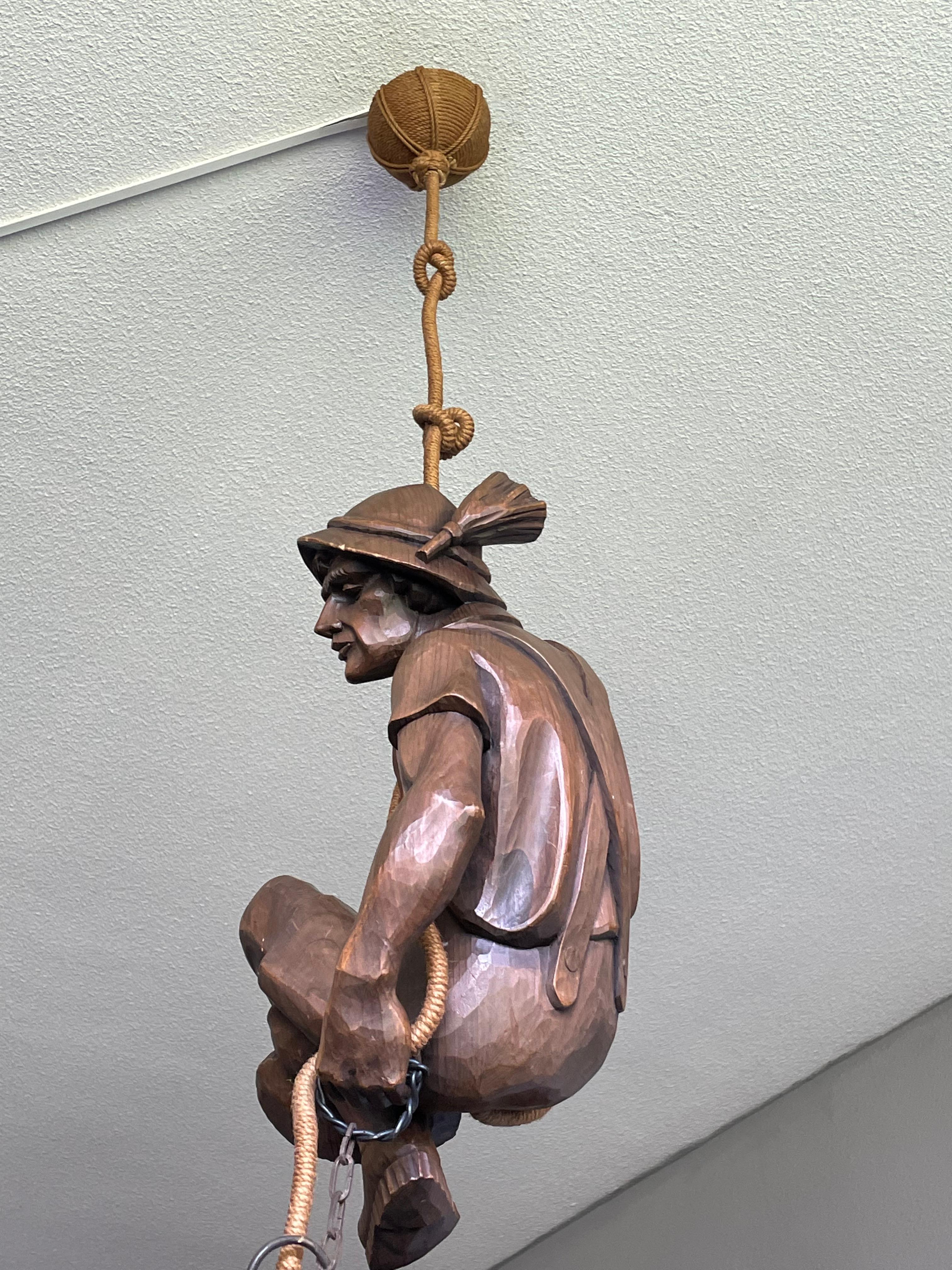 Wood Hand Carved Mountaineer Sculpture Pendant Light w. Brass Arts & Crafts Lantern For Sale