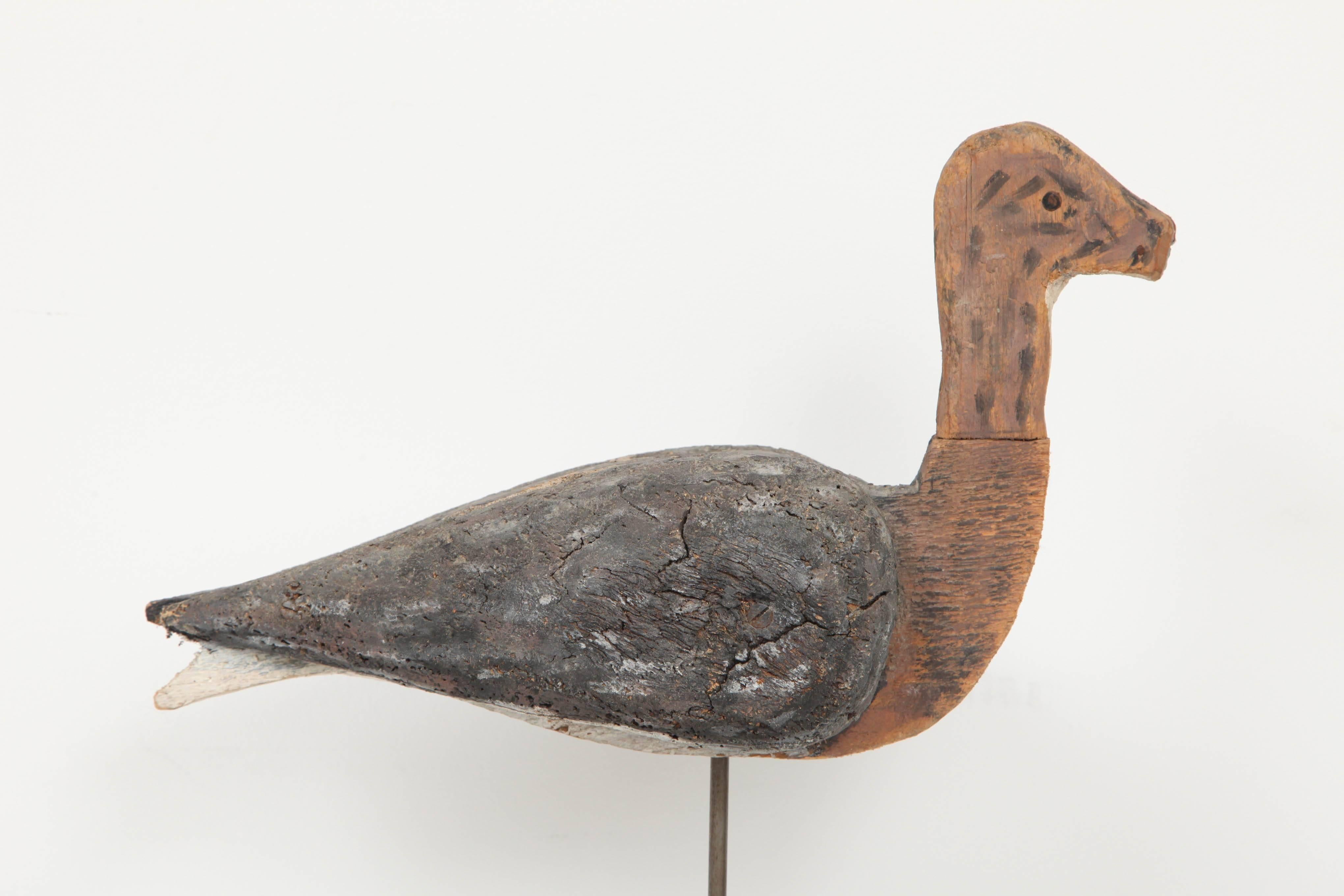 Hand carved mounted duck decoy.