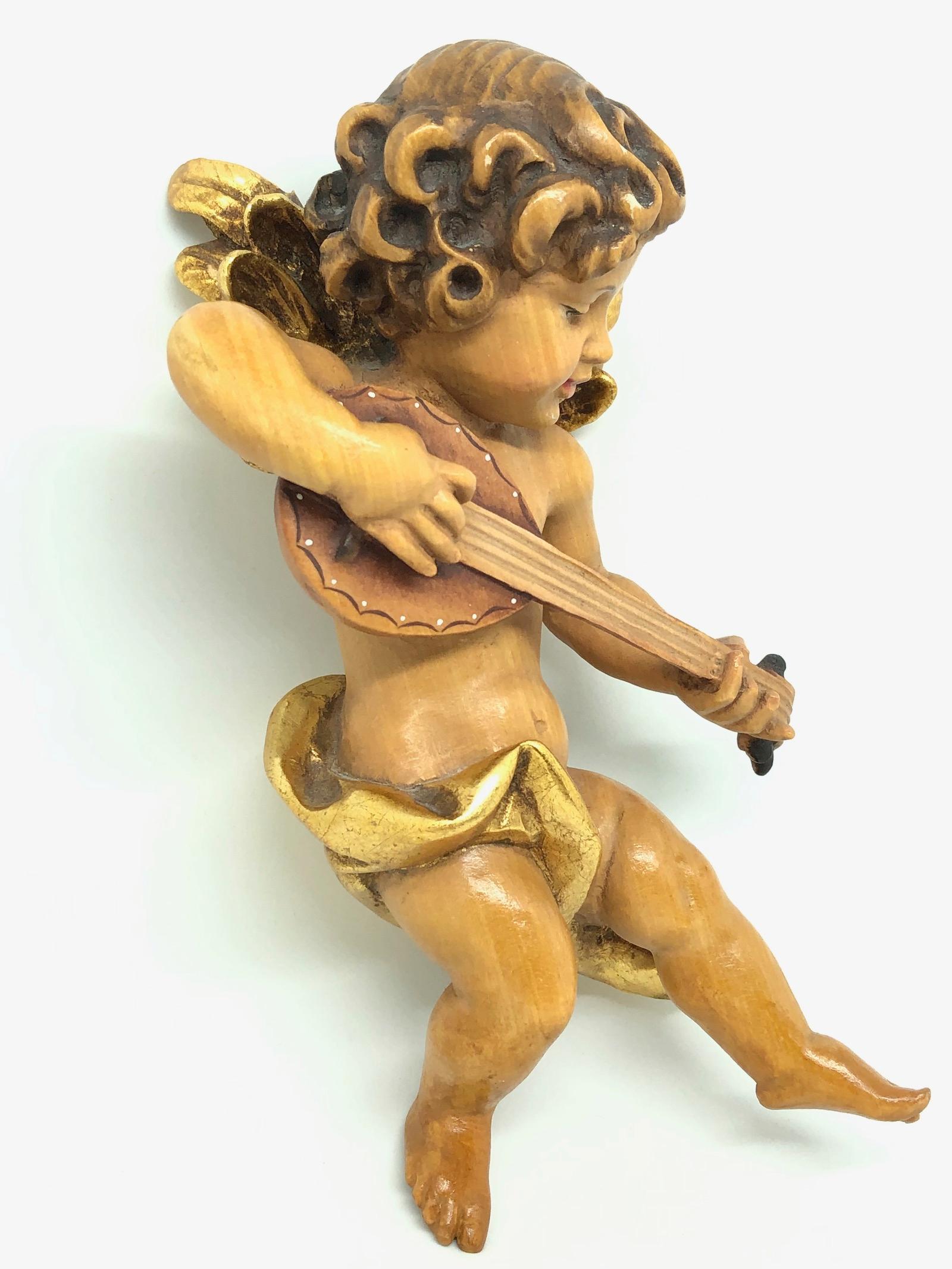 cherub playing guitar