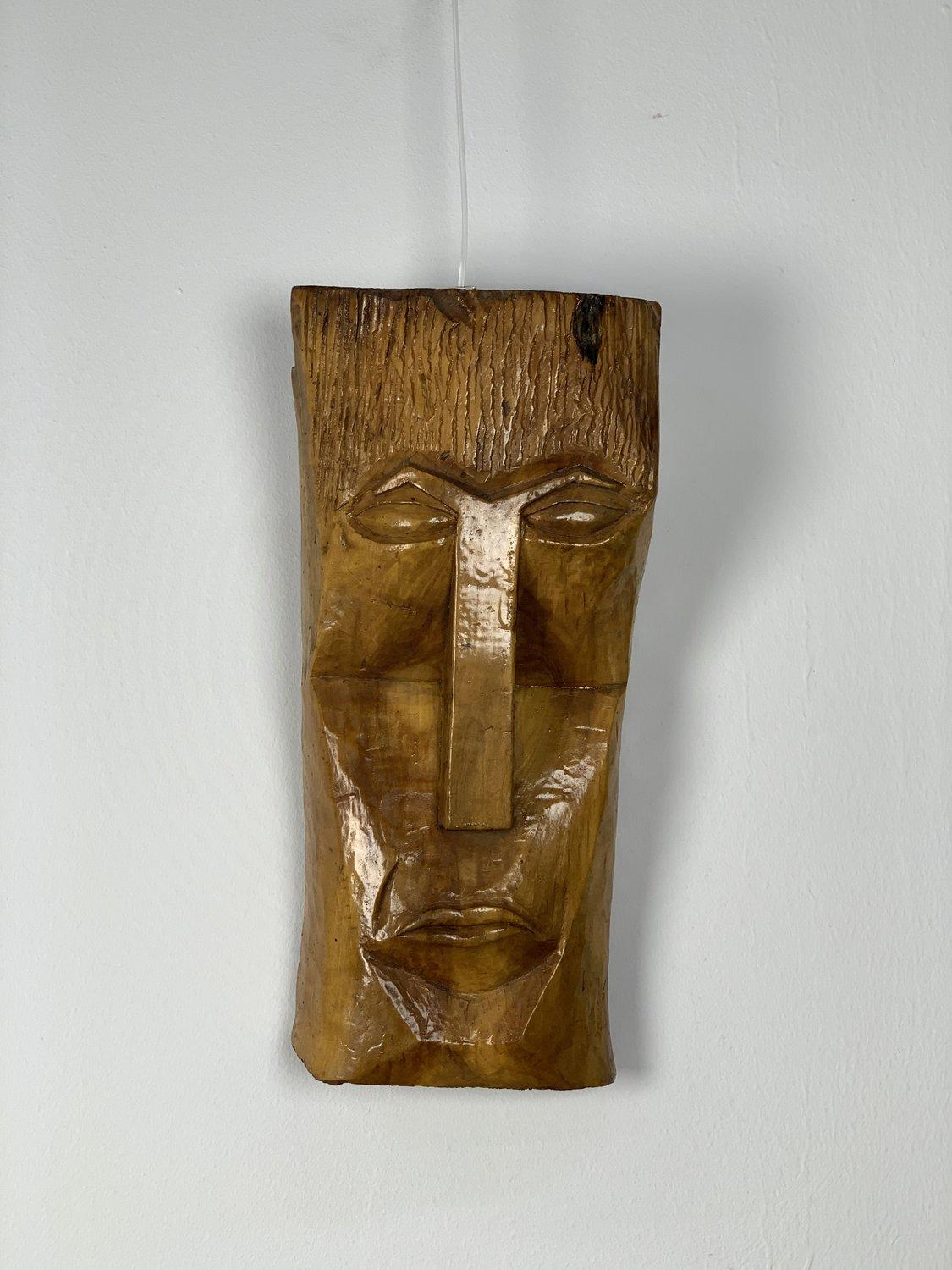 Decorative hand carved Mid-century wooden wall mask, lacqered finish. Artist unknown.
 