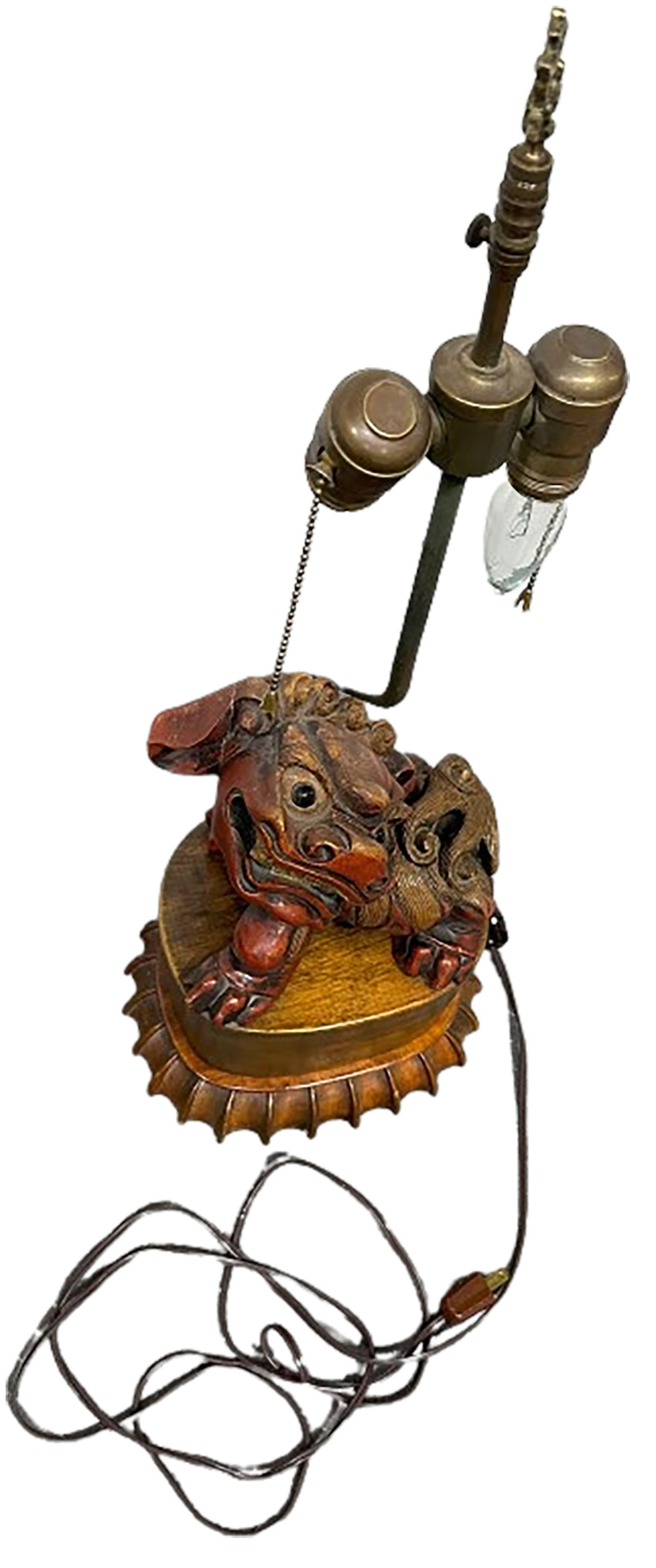 Chinese Hand Carved Nanmu Wood Foo Lion Lamp with Dual Bulb Inlet For Sale