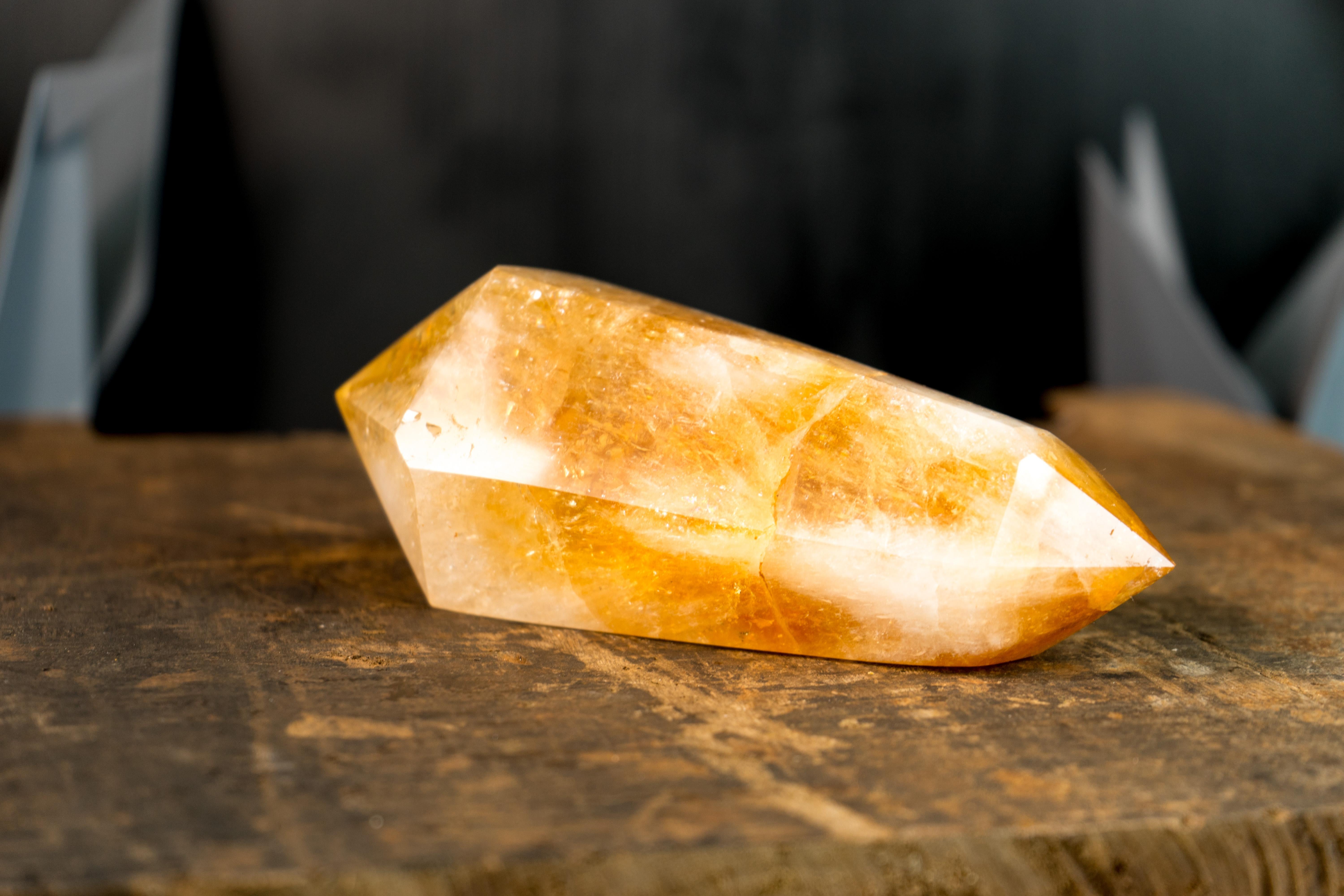 A gorgeous, large, double-terminated Brazilian Citrine point that brings a fabulous deep orange citrine color, which is characteristic of high-grade citrines. This is formed in an XL-size specimen, rarely seen in Citrines from South Brazil. The