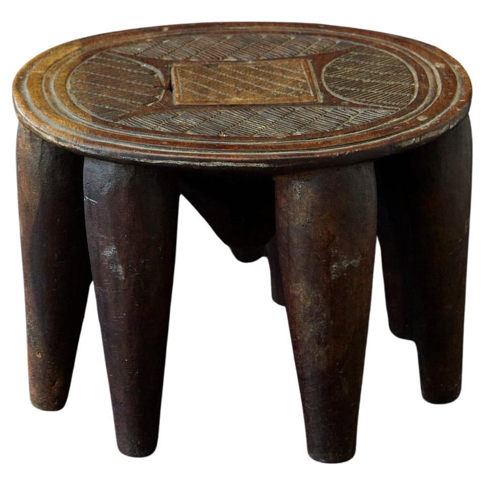 Hand Carved Nupe Stool with 8 Legs, Nigeria, 1950s For Sale