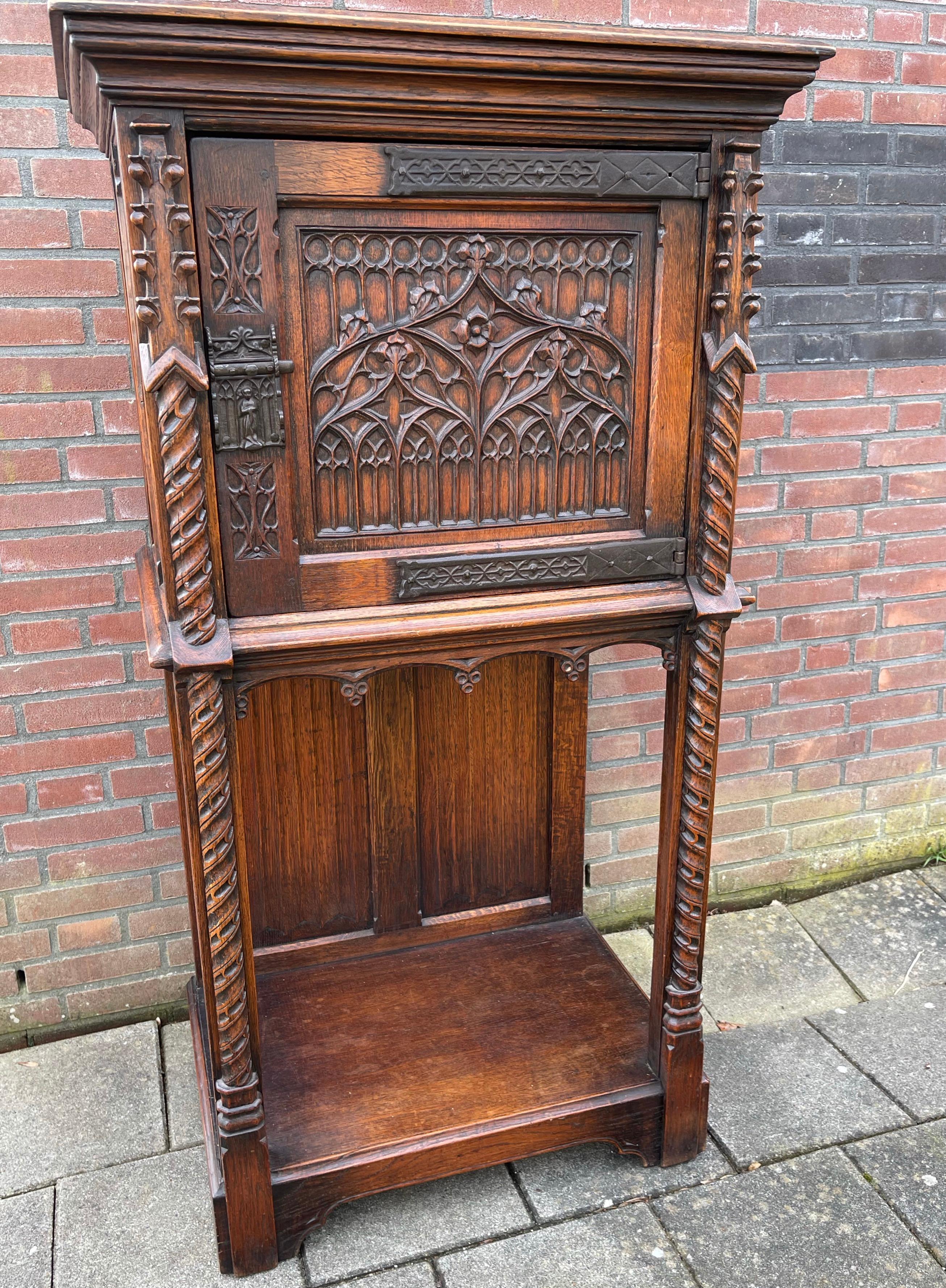 Wonderful craftsmanship and highly practical, Gothic Revival cabinet.

This single door Gothic style cabinet is as stable as the day it was made and apart from some minor imperfections it is in excellent condition as well. Thanks to its practical