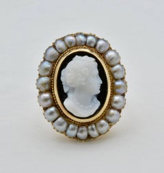 Hand-Carved Onyx Cameo Ring with Pearl Halo from Napoleon III in 18 Karat Gold