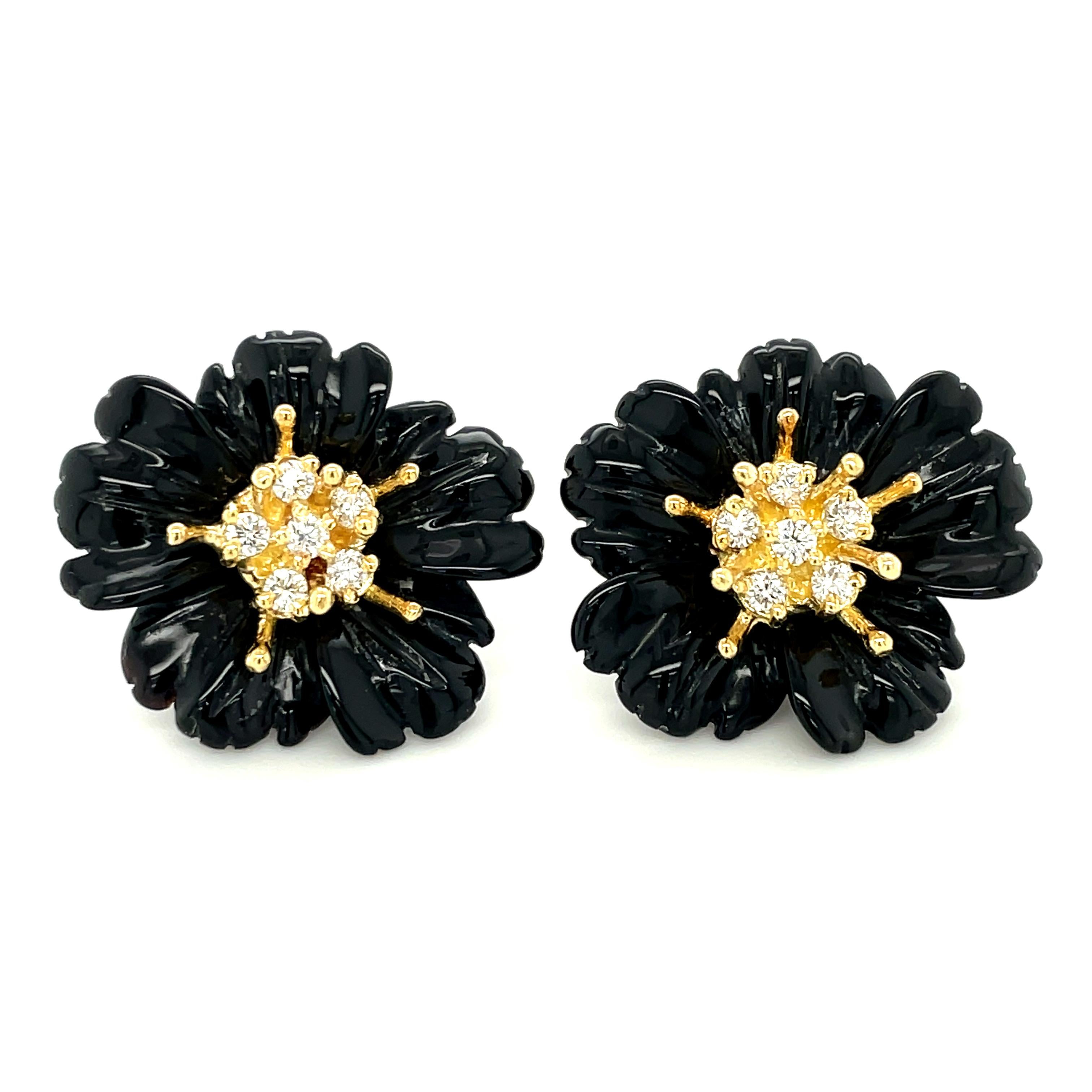 These finely hand-carved onyx earring jackets will add elegant and eye-catching style to your jewelry wardrobe! The 3-dimensional flowers were intricately carved from high-quality onyx and look stunning paired with our 18 yellow gold post earrings.