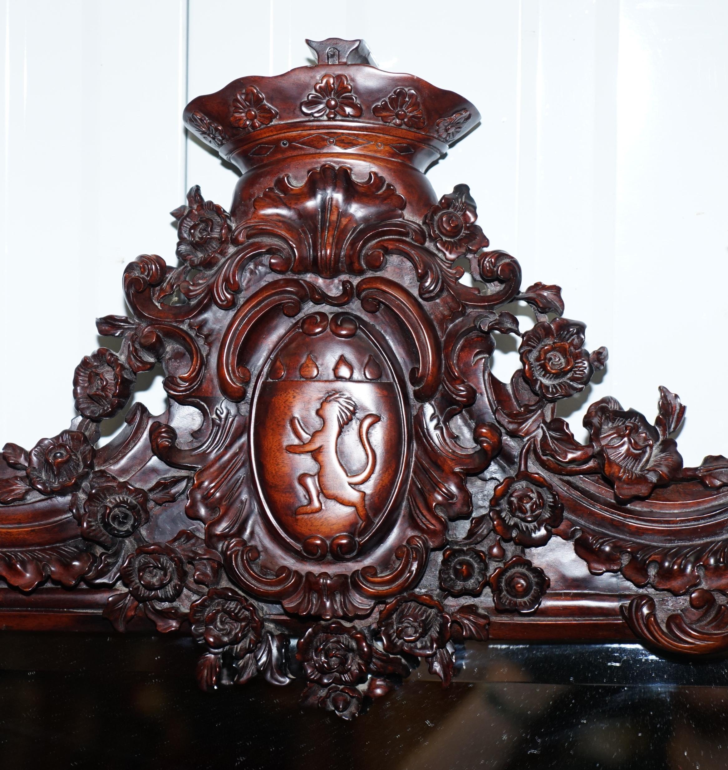 Modern Hand Carved Ornate Mahogany Mirror with Armorial Crest Horns Animals Flowers Cow