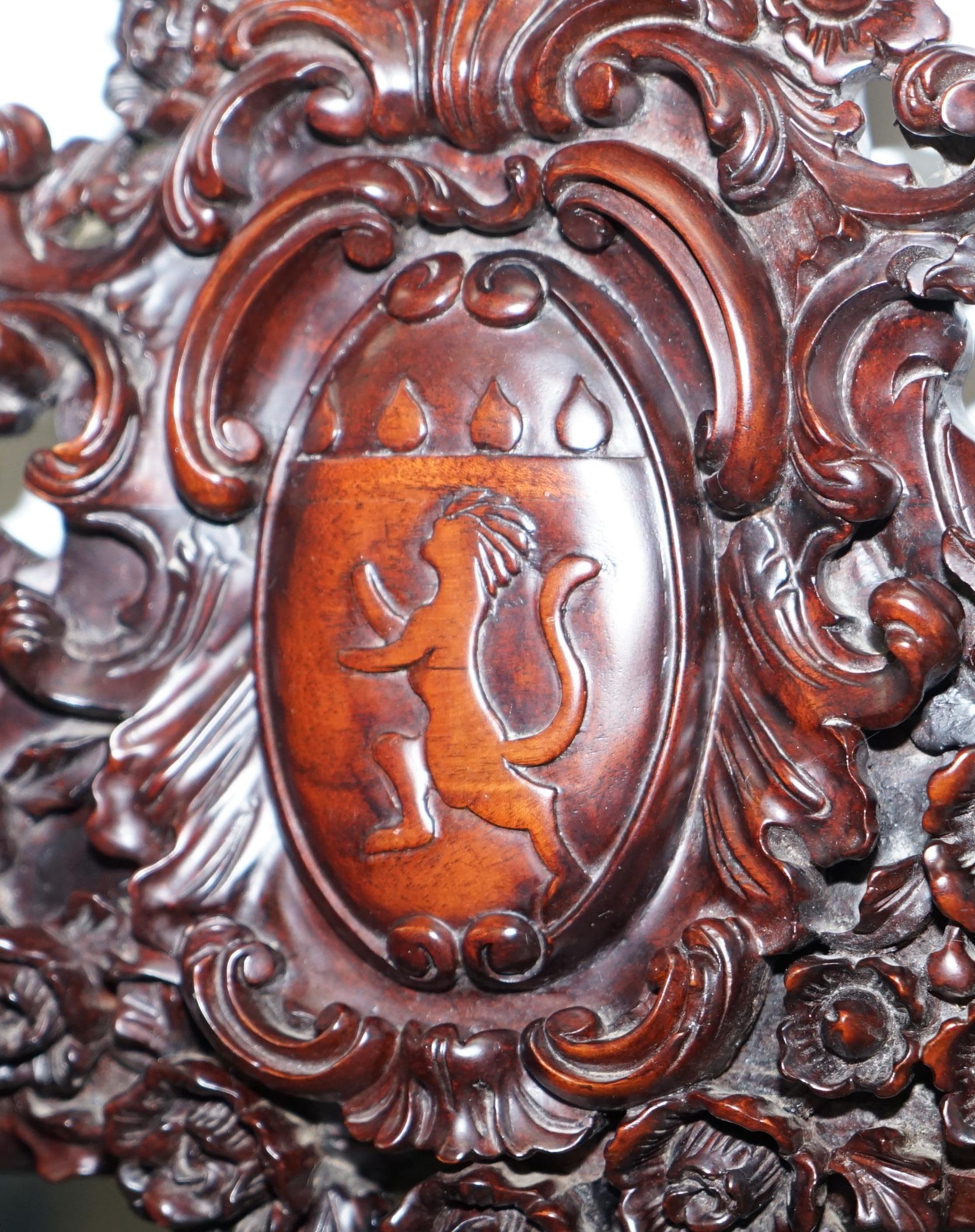 English Hand Carved Ornate Mahogany Mirror with Armorial Crest Horns Animals Flowers Cow
