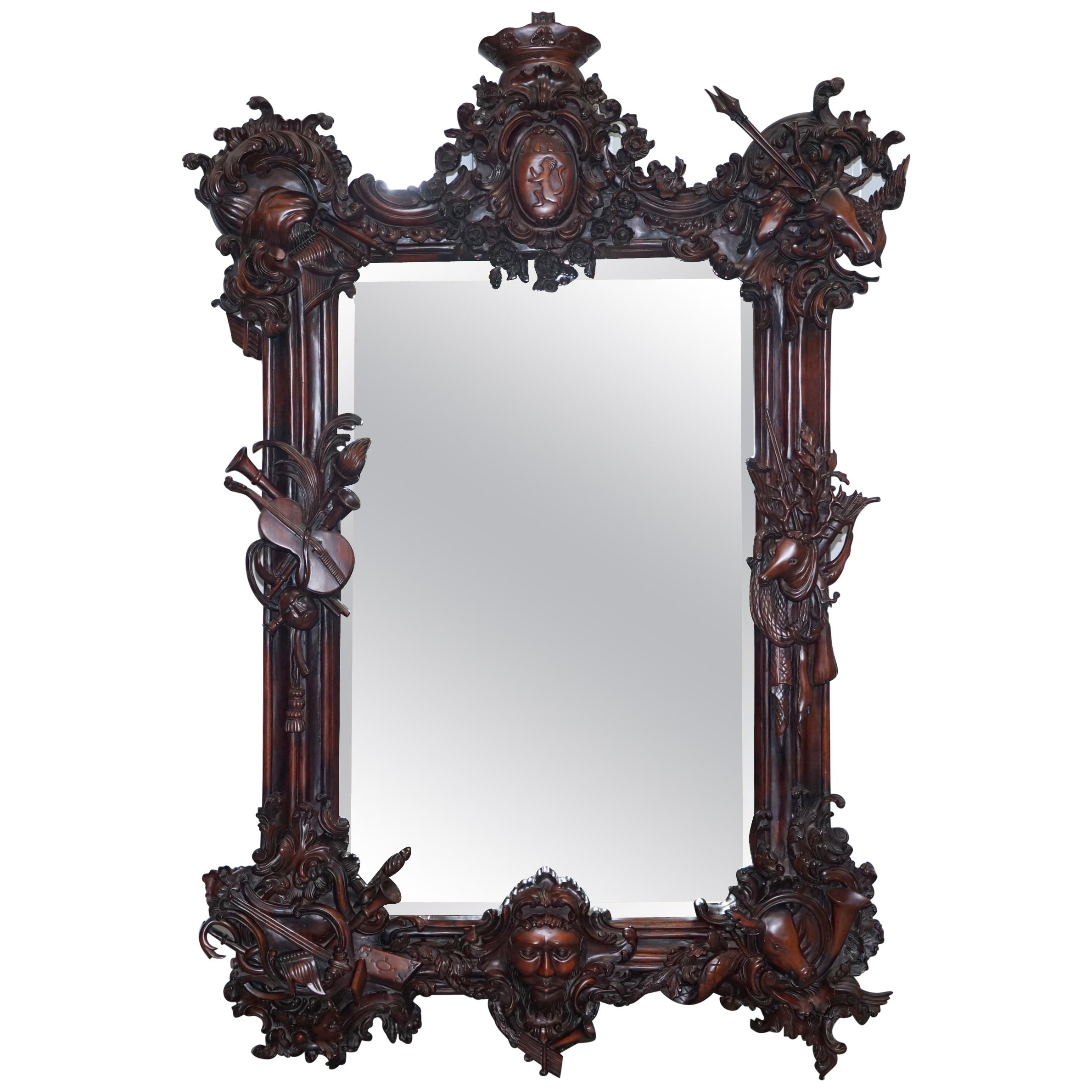Hand Carved Ornate Mahogany Mirror with Armorial Crest Horns Animals Flowers Cow