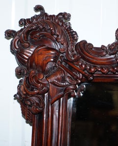 Hand Carved Ornate Mahogany Mirror with Armorial Crest Horns Animals Flowers Cow
