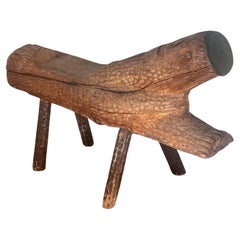 Hand-carved outsider art bench with face, twentieth century