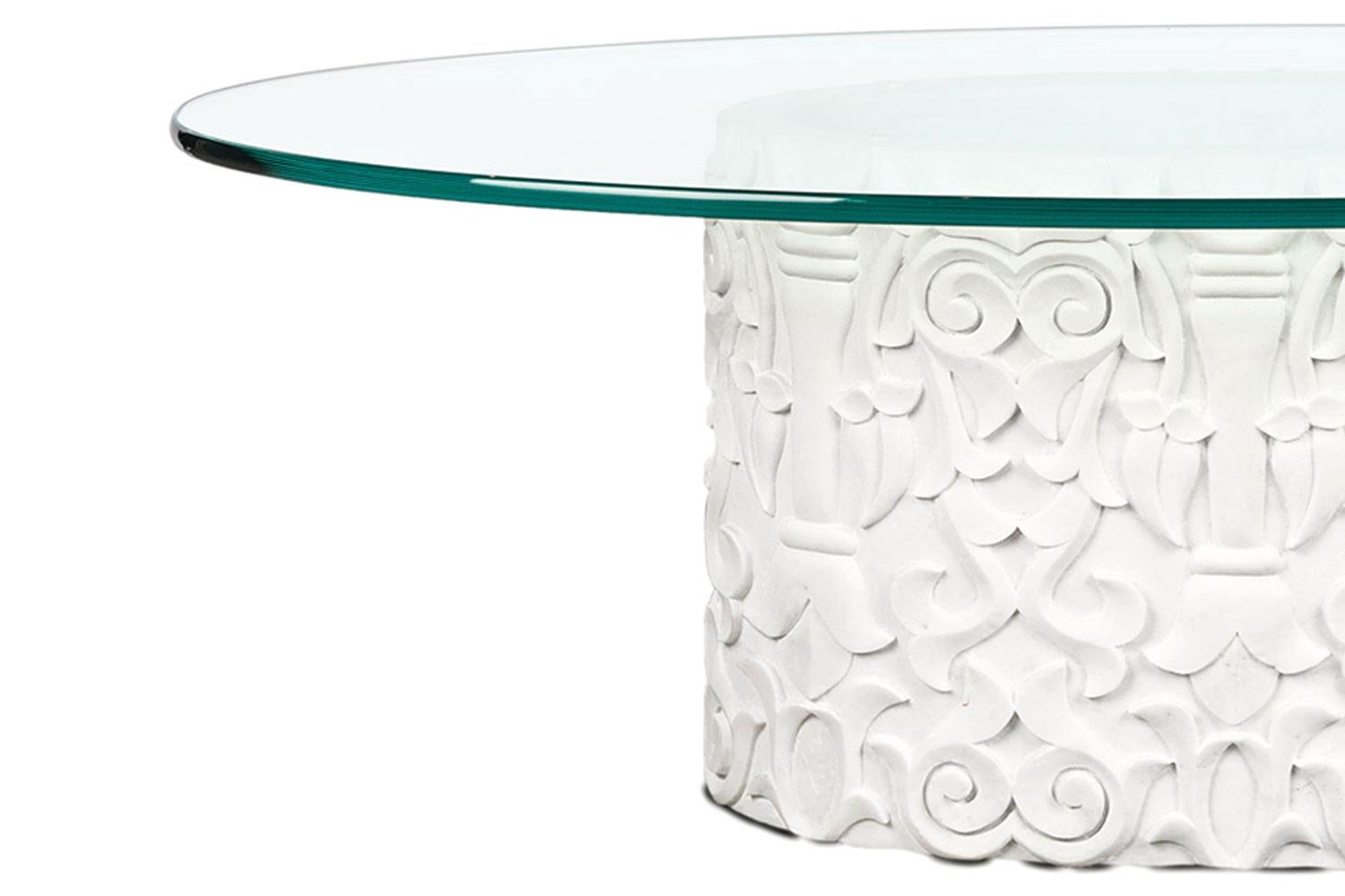 Lotus Hand-Carved Oval marble coffee table + glass top By Stephanie Odegard

This coffee table has an oval glass top and hand-carved marble base and is made in India. A beautiful example of a contemporary design inspired by an ancient culture.
