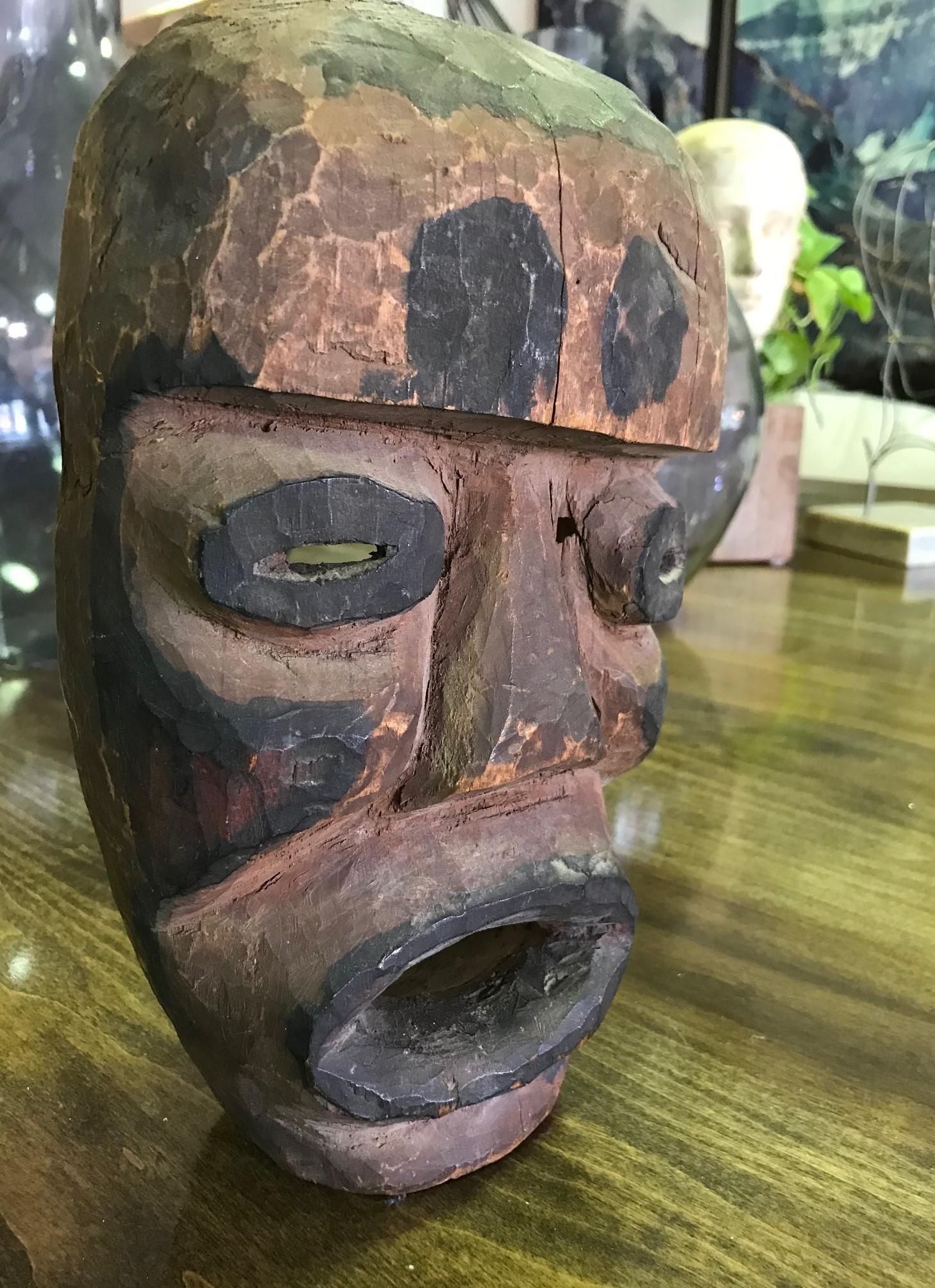 Hand Carved Wood Painted and Pigmented Primitive Tribal Mask For Sale 1