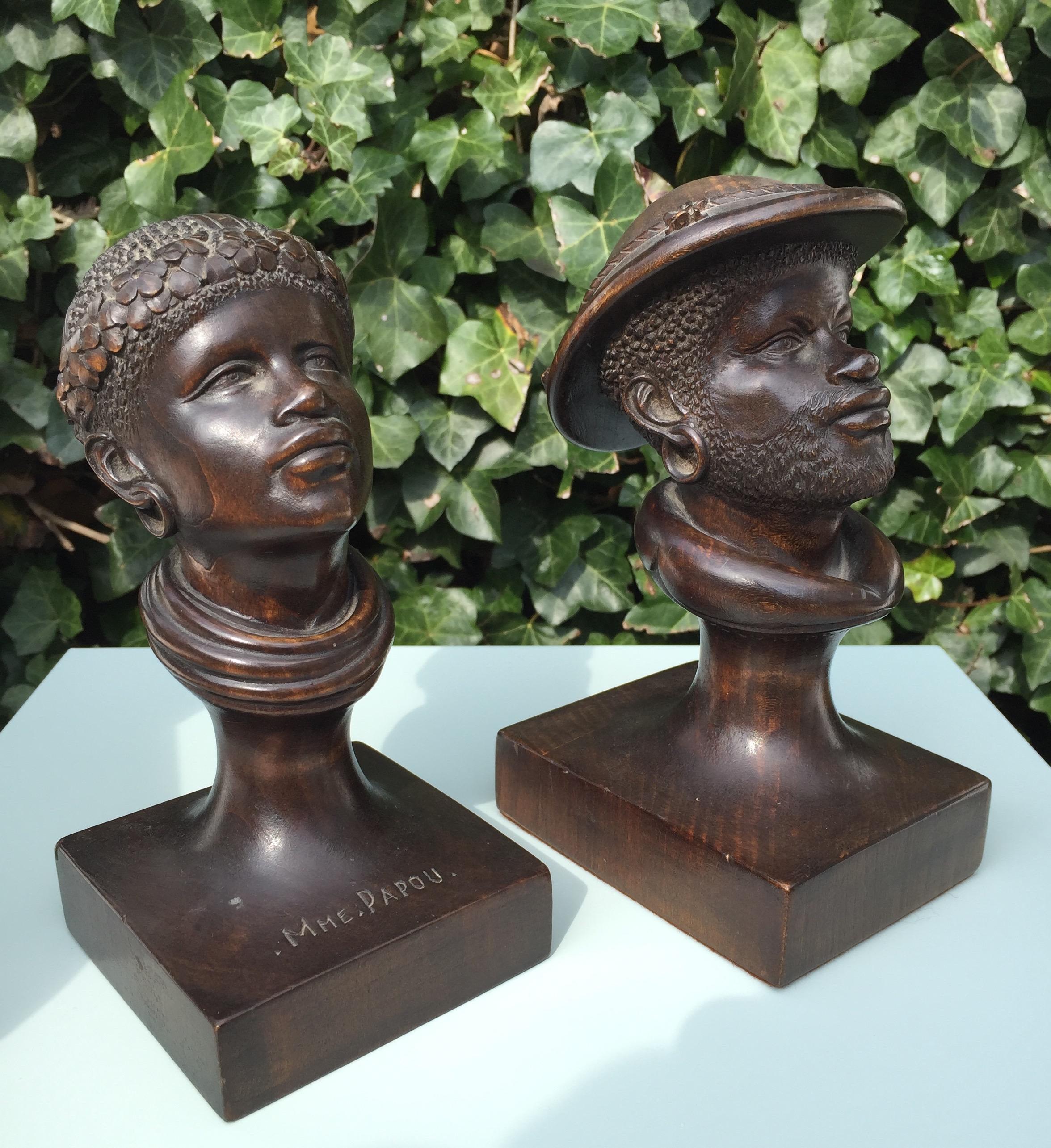 Museum quality and condition pair of busts.

Anyone who knows a little bit about indigenous art immediately can tell that these sculptures were not carved by a local artist. These are clearly in the realistic style of a European craftsman. Belgian