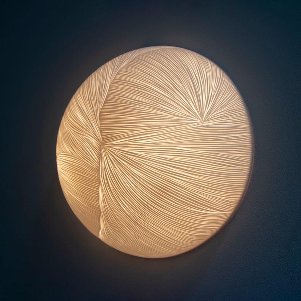 Engraved Hand-carved porcelain and brass semi sphere wall sconce by Vezzini & Chen For Sale