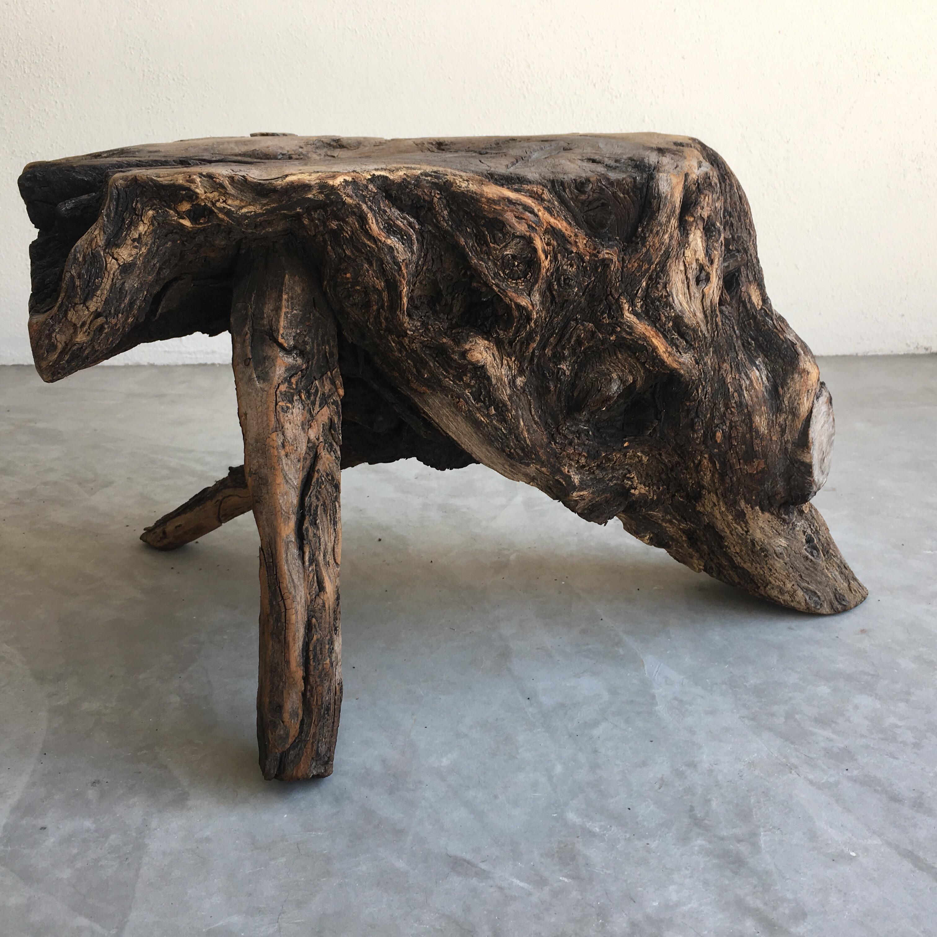 Hand carved Primitive styled mesquite hardwood stool from the Sierra Gorda region of Guanajuato, Mexico. This is a one of a kind piece.
