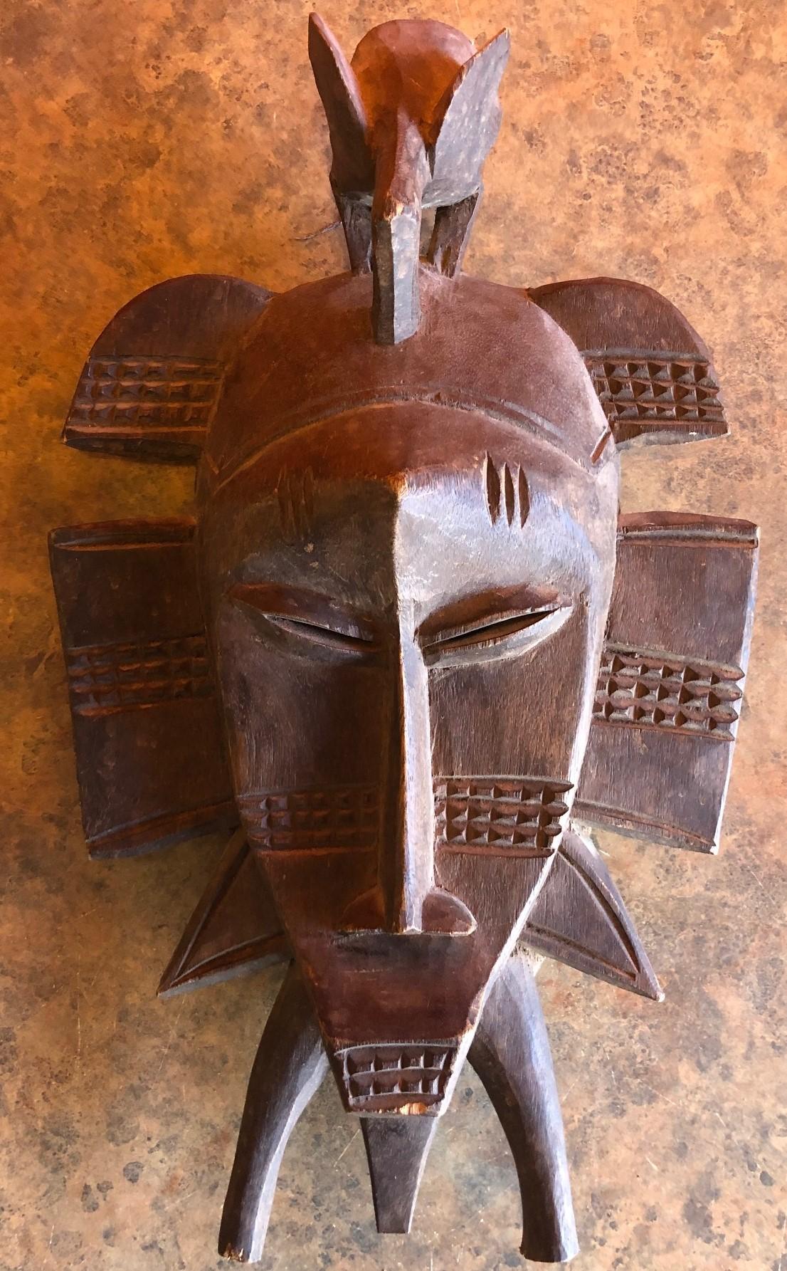 Ivorian Hand Carved Primitive Senufo Kpelie Tribal Mask from the Ivory Coast
