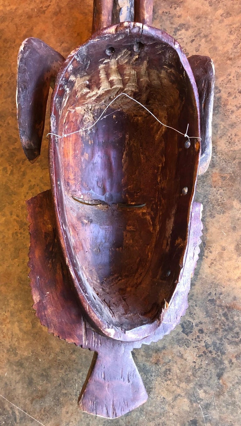 Hand Carved Primitive Tribal Mask For Sale at 1stDibs