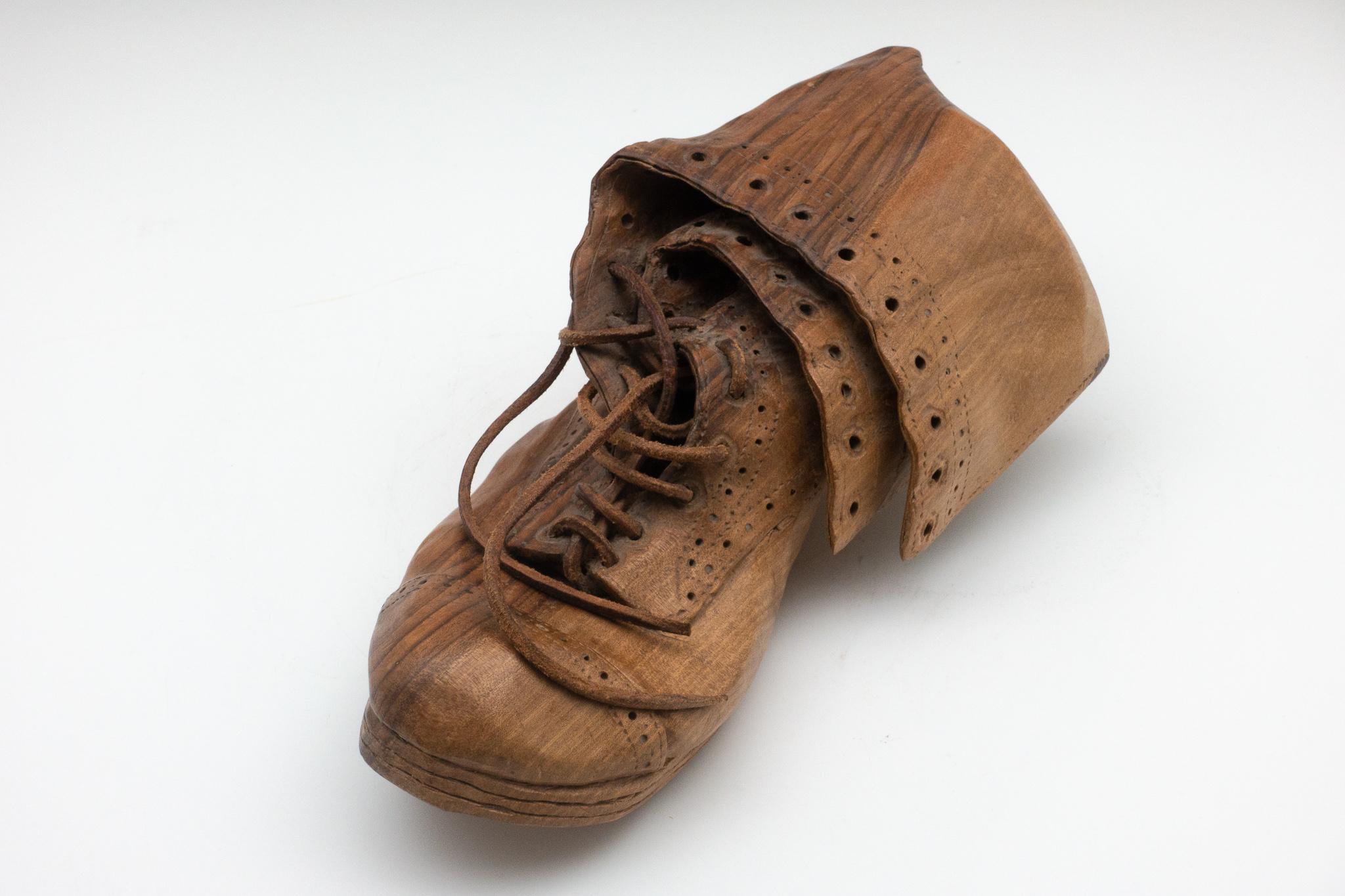 Hand-carved old wooden boot signed L. de Verdal. Louis de Verdal is a French artist known for his work in wood and metal. Louis de Verdal work is inspired by diverse materials and the most unexpected combinations.