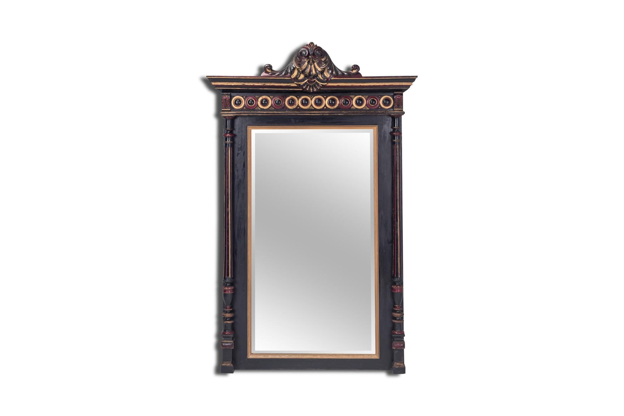 Regency style French overmantel mirror. 

This 19th century Piece is hand-carved and hand-painted, showing stunning shapes and details. The color combination; black, gold and royal red give this piece an extraordinary rich appearance.