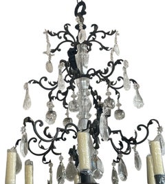 Hand-Carved Rock Crystal and Wrought Iron Chandelier. U.S.A. Late 20th Century.