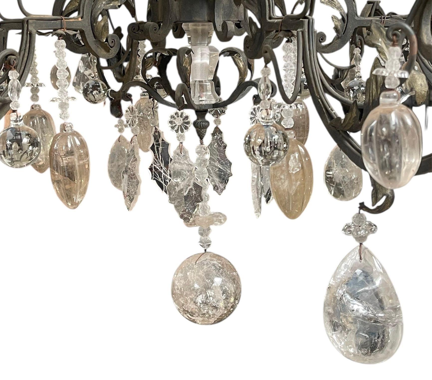 American Hand-Carved Rock Crystal and Wrought Iron Chandelier. U.S.A. Late 20th Century. For Sale