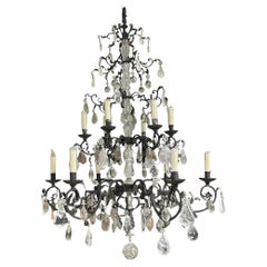 Hand-Carved Rock Crystal and Wrought Iron Chandelier. U.S.A. Late 20th Century.