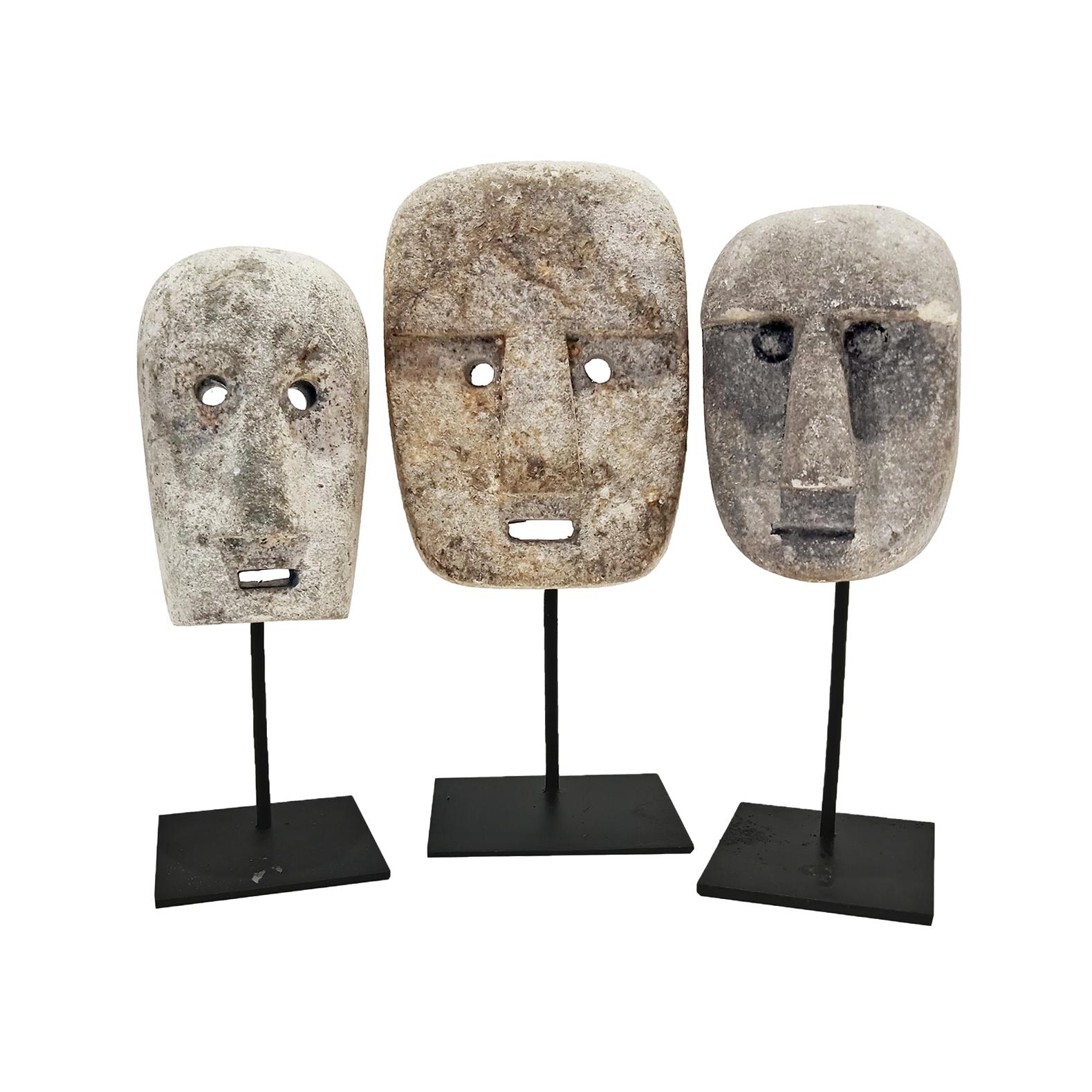 Hand-Carved Rock Face Sculptures from Indonesia 6