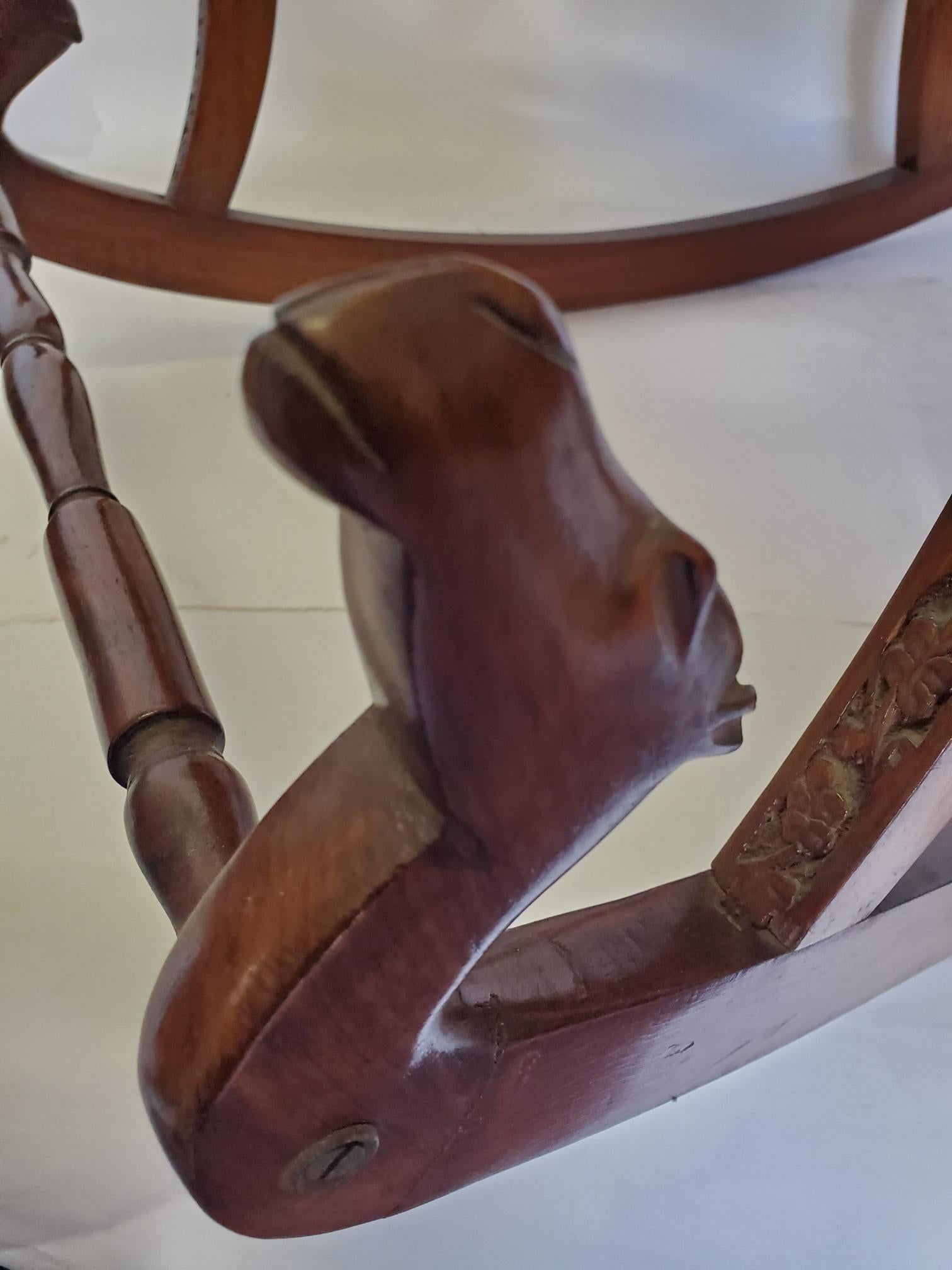 20th Century Hand Carved Rocking Chair with Floral and Camel Design