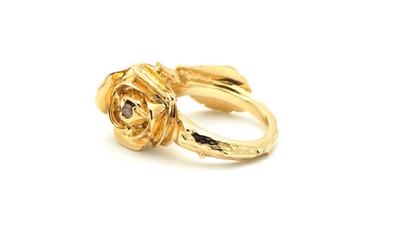 This is an incredible ring as it has been carved from a piece of gold as opposed to being casted, the artwork is incredible, someone had to sit hours and hours making this rose out of metal, very intriguing ring, heavy not flimsy at all! Made with a